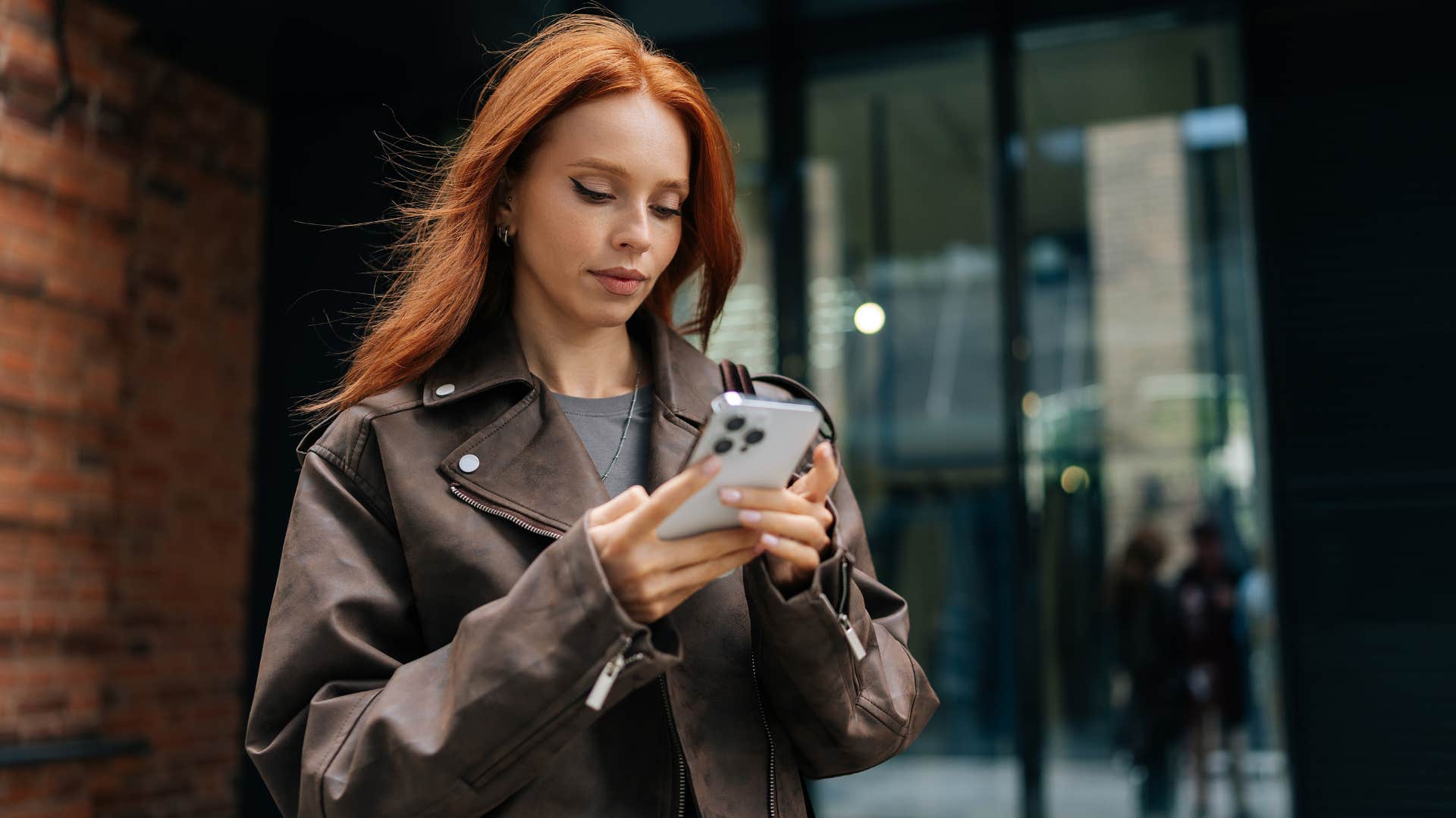 a woman debates whether to text back or not to avoid conflict