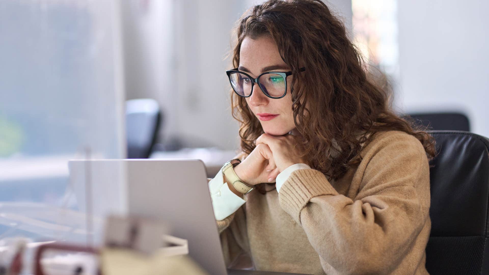 woman being productive working in the office