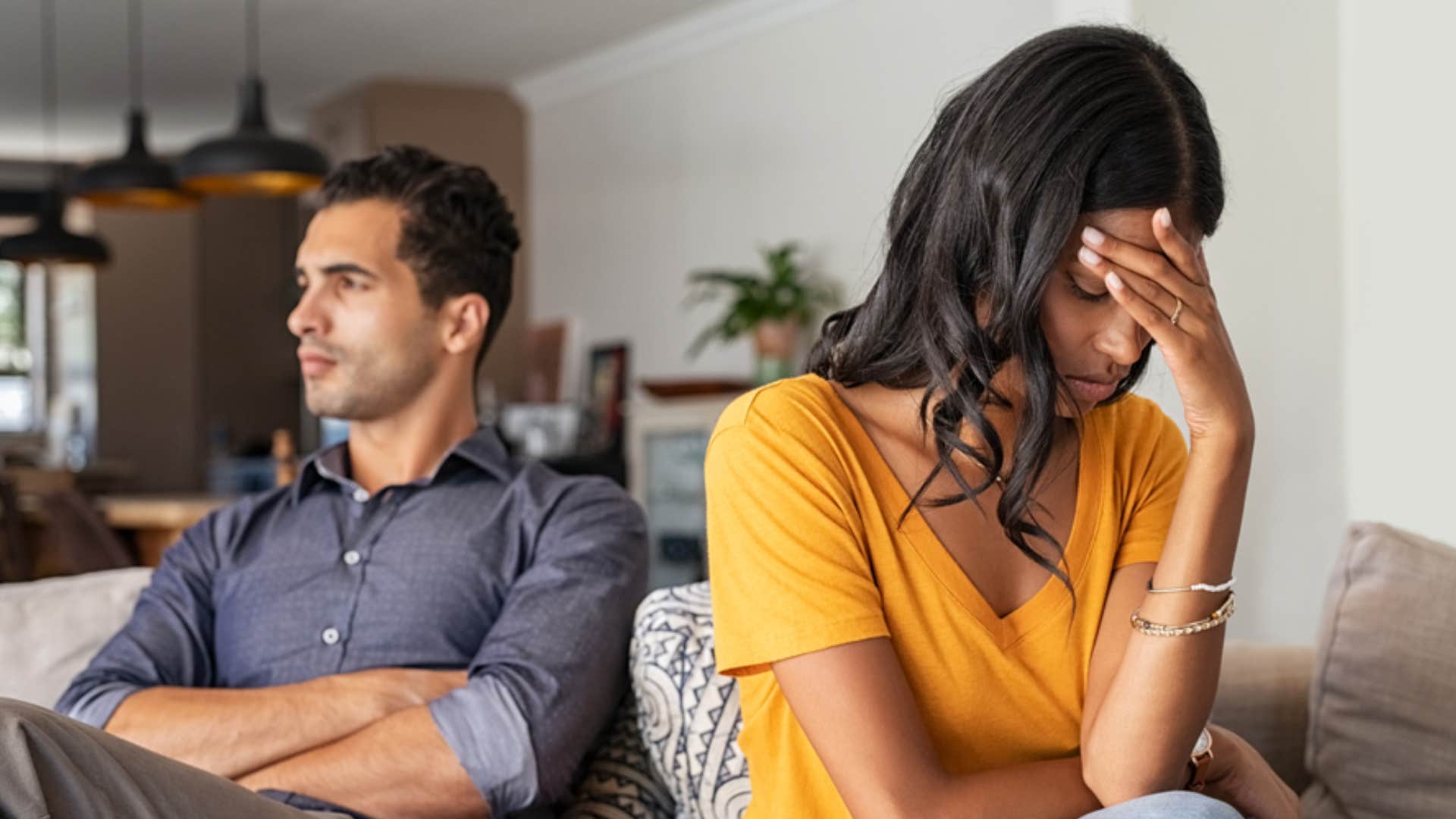 unhappy married couple believing their relationship is far beyond help 