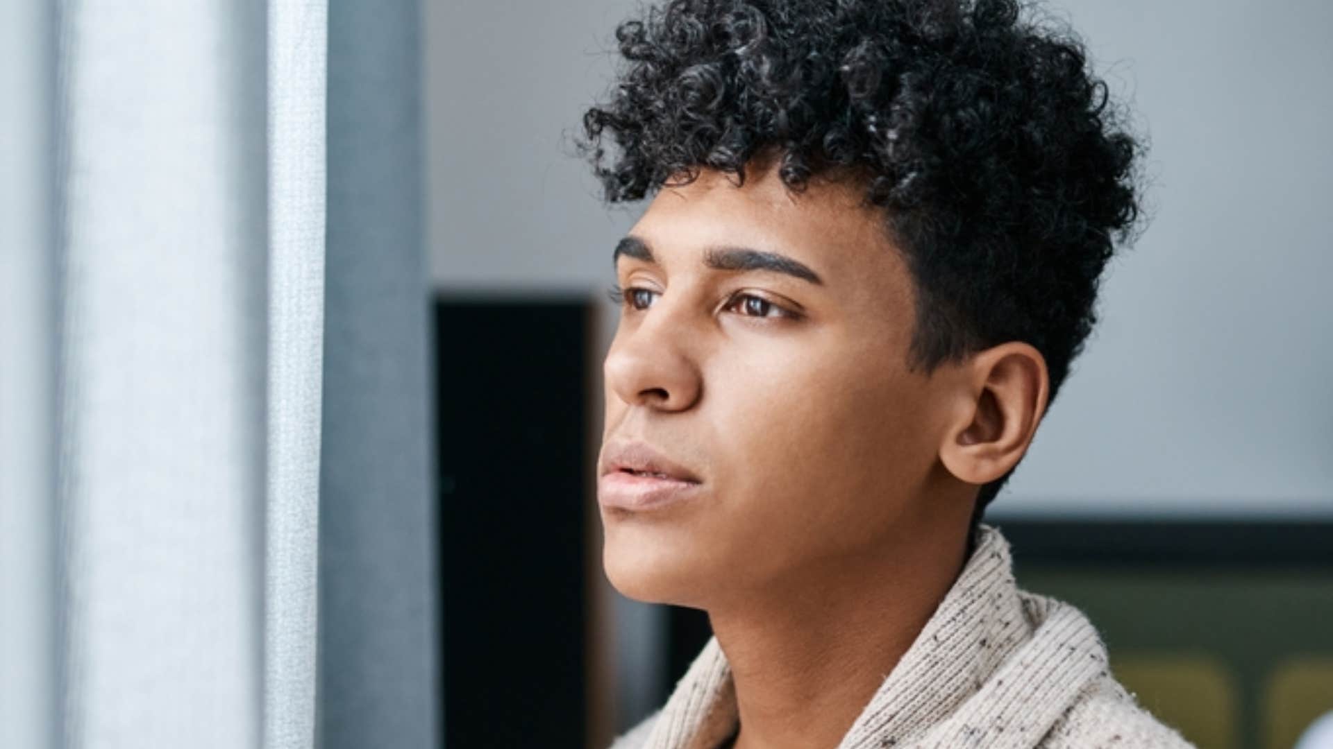 man suffering from an overload of social anxiety