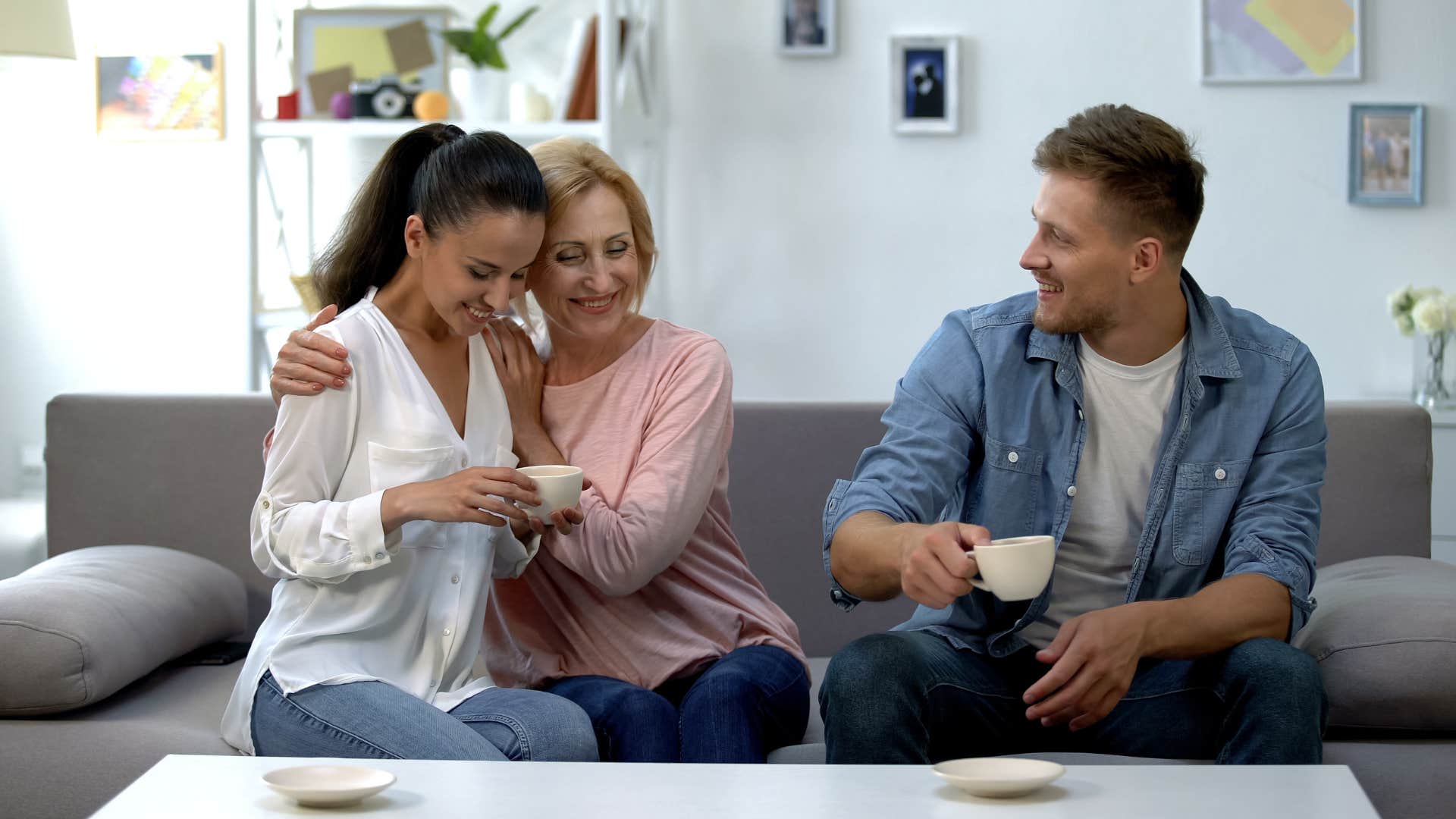 a mother has plenty of room for her son and his girlfriend to be sit comfortably