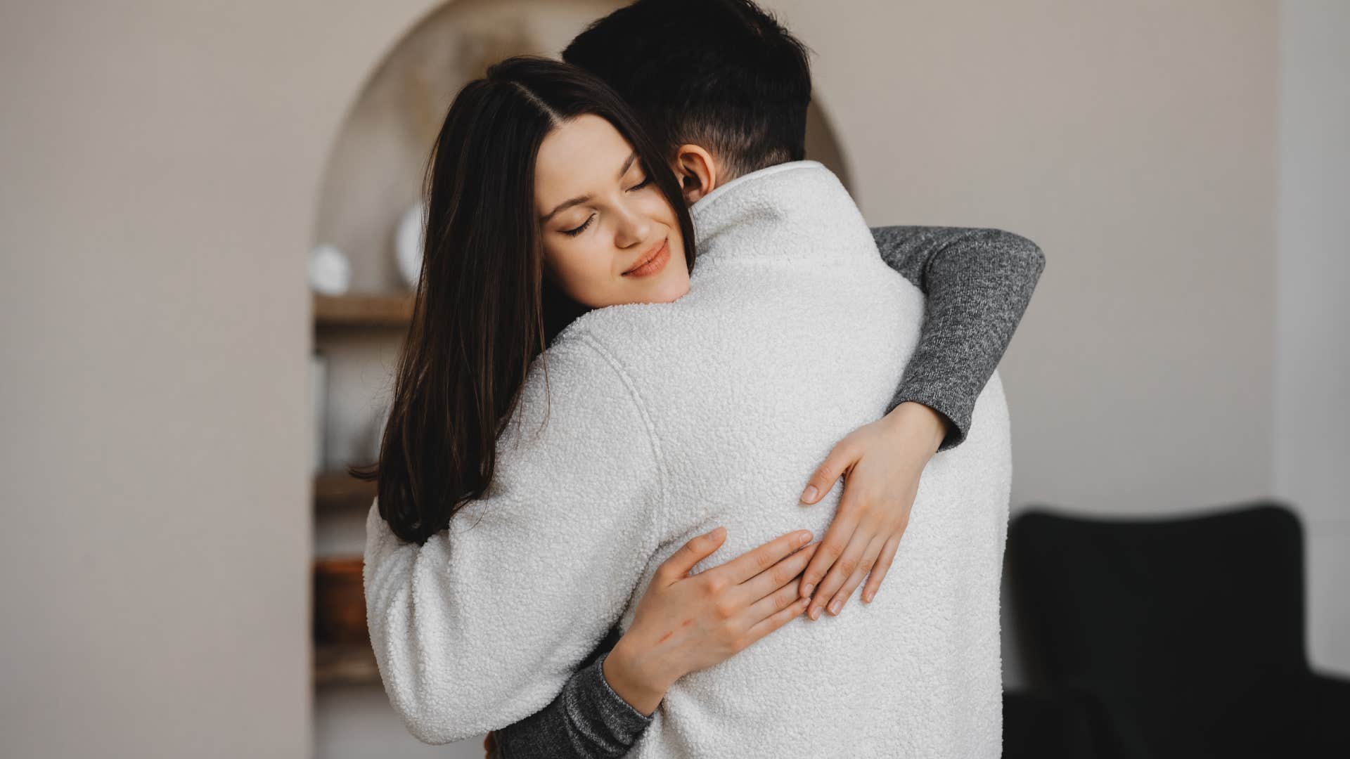 couple hugging through tough moment