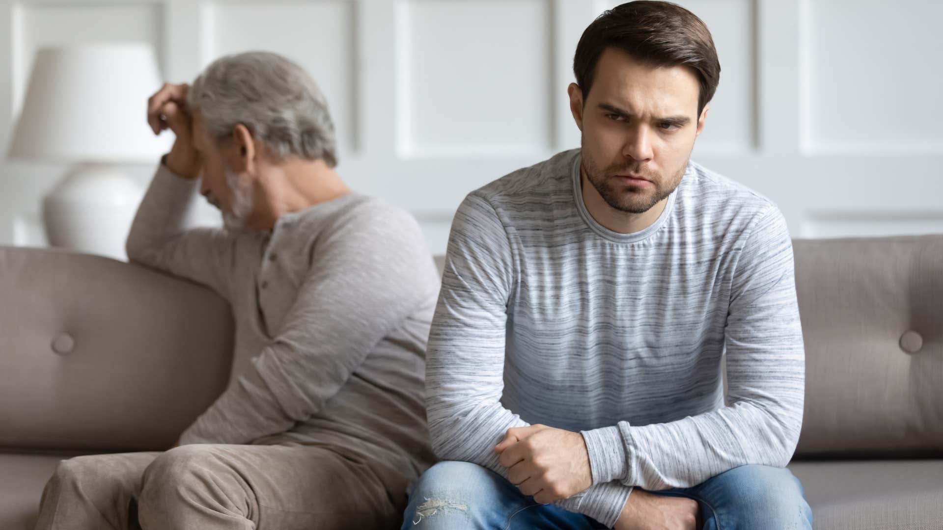 Man saying "we did fine without therapy" to his upset adult son.