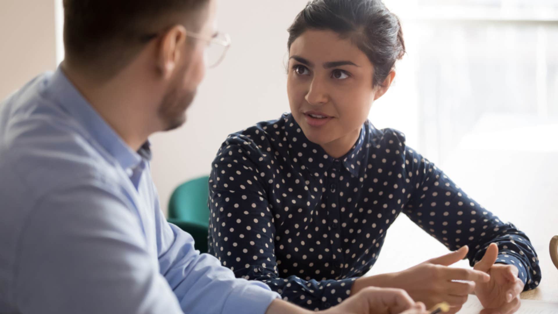 woman reminding rude colleague that speaking to her is a privilege he doesn't have 