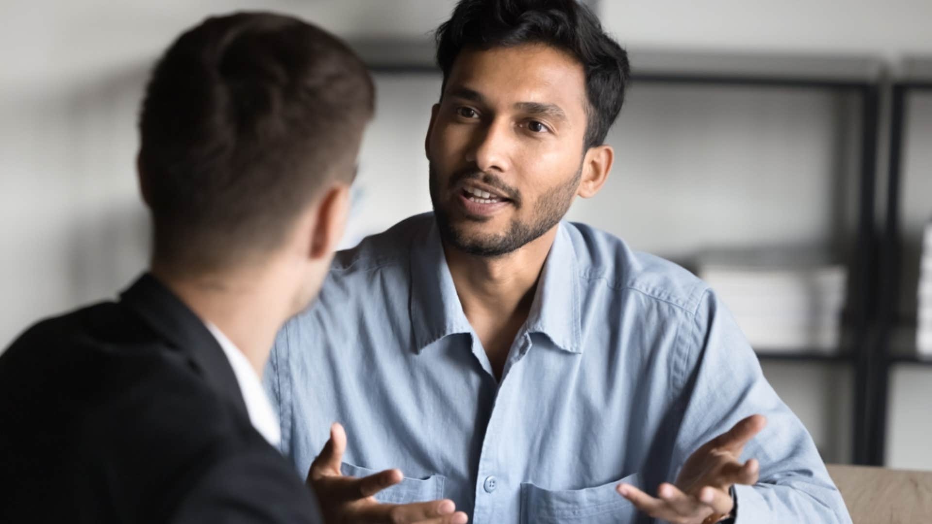 man calling out colleague who misunderstands and undermines him
