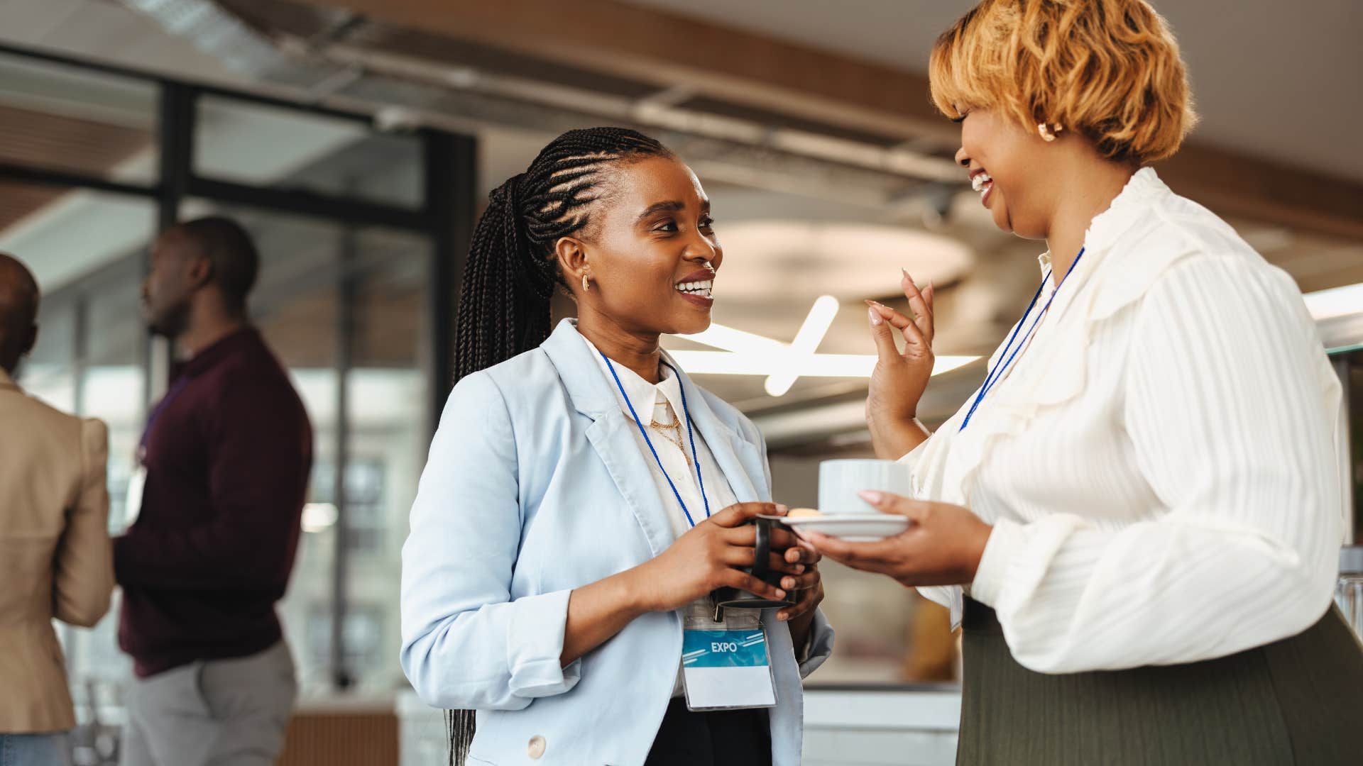 a young woman tells her older coworker that she does not need her advice