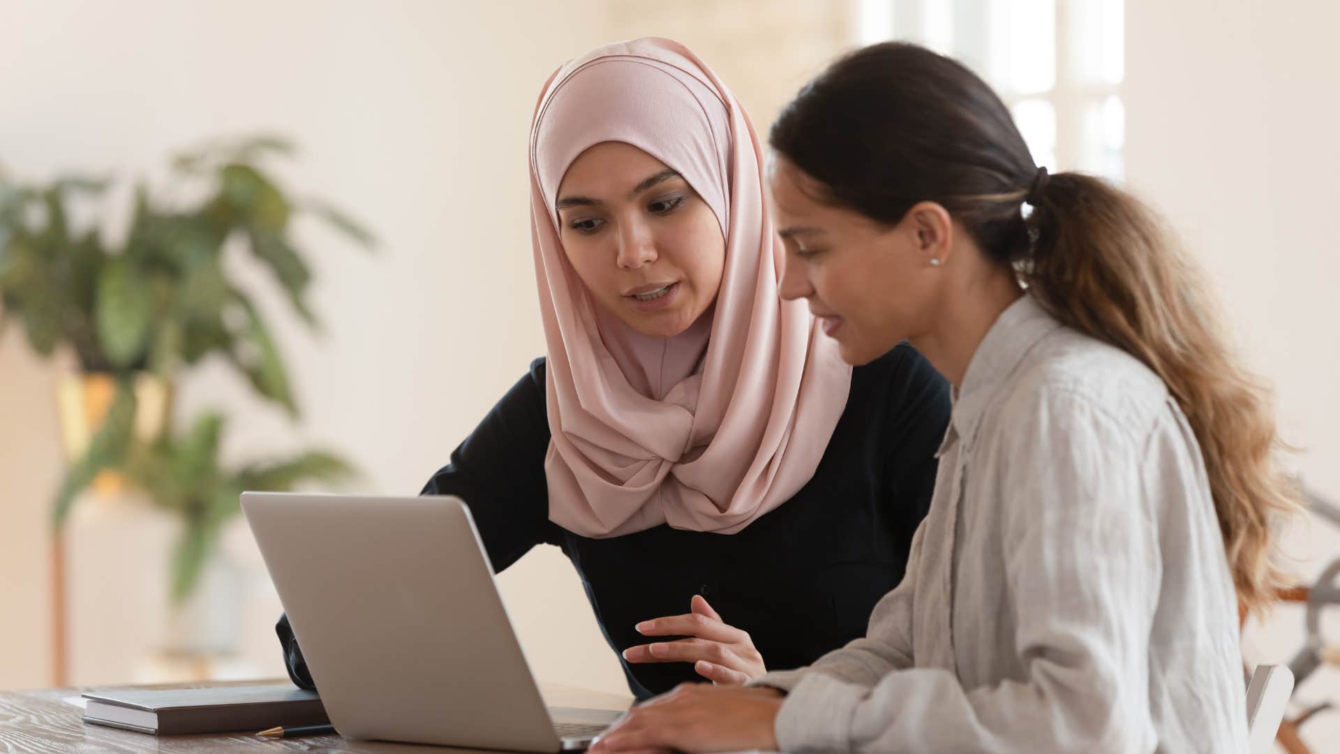 a woman tells her supervisor that she will take what she says under advisement