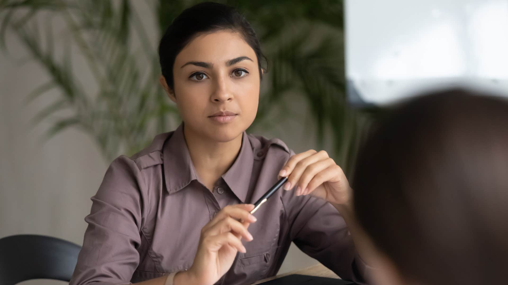 a woman tells a coworker that she is not getting into something right now