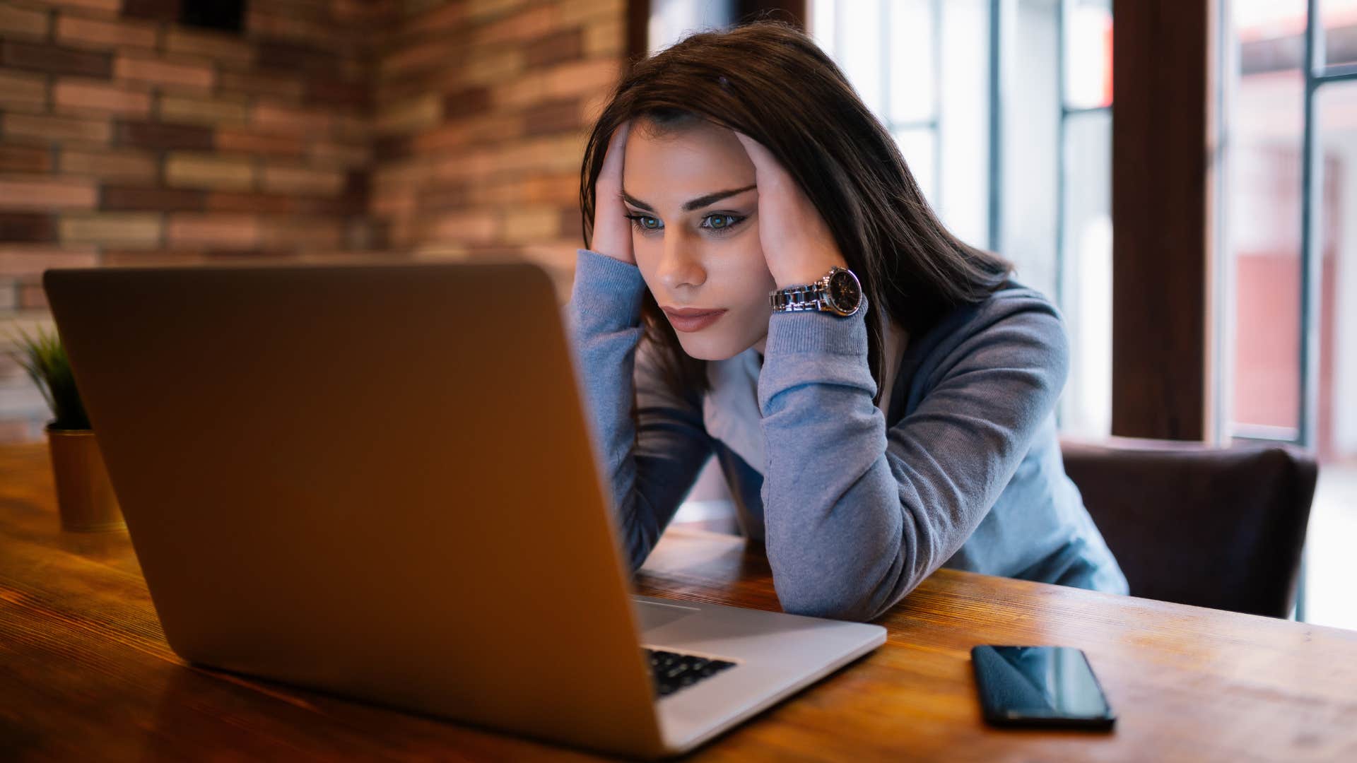 a woman in a work meeting tells her coworkers that they should on cover what they need to