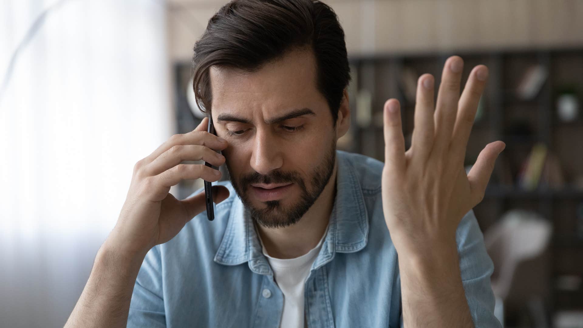 entitled man saying you owe me to someone on the phone
