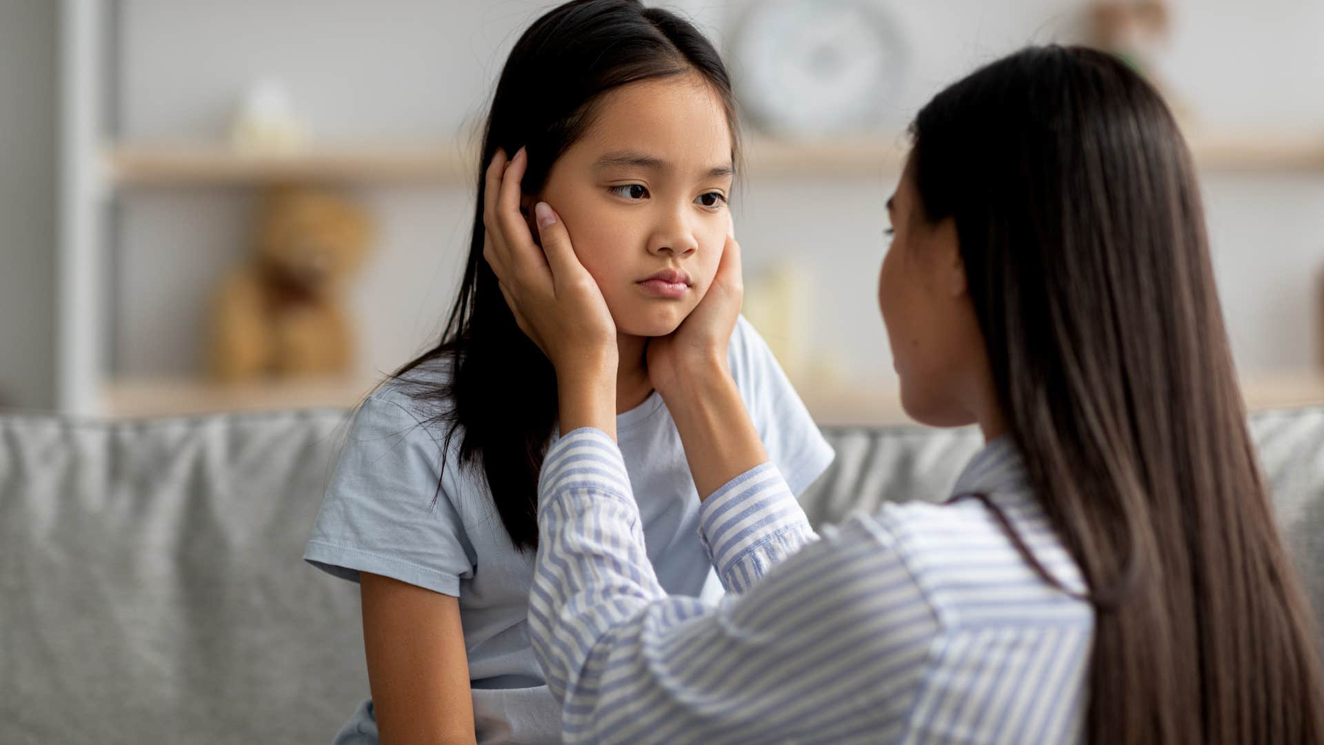 woman comforting daughter to be grateful for what she has
