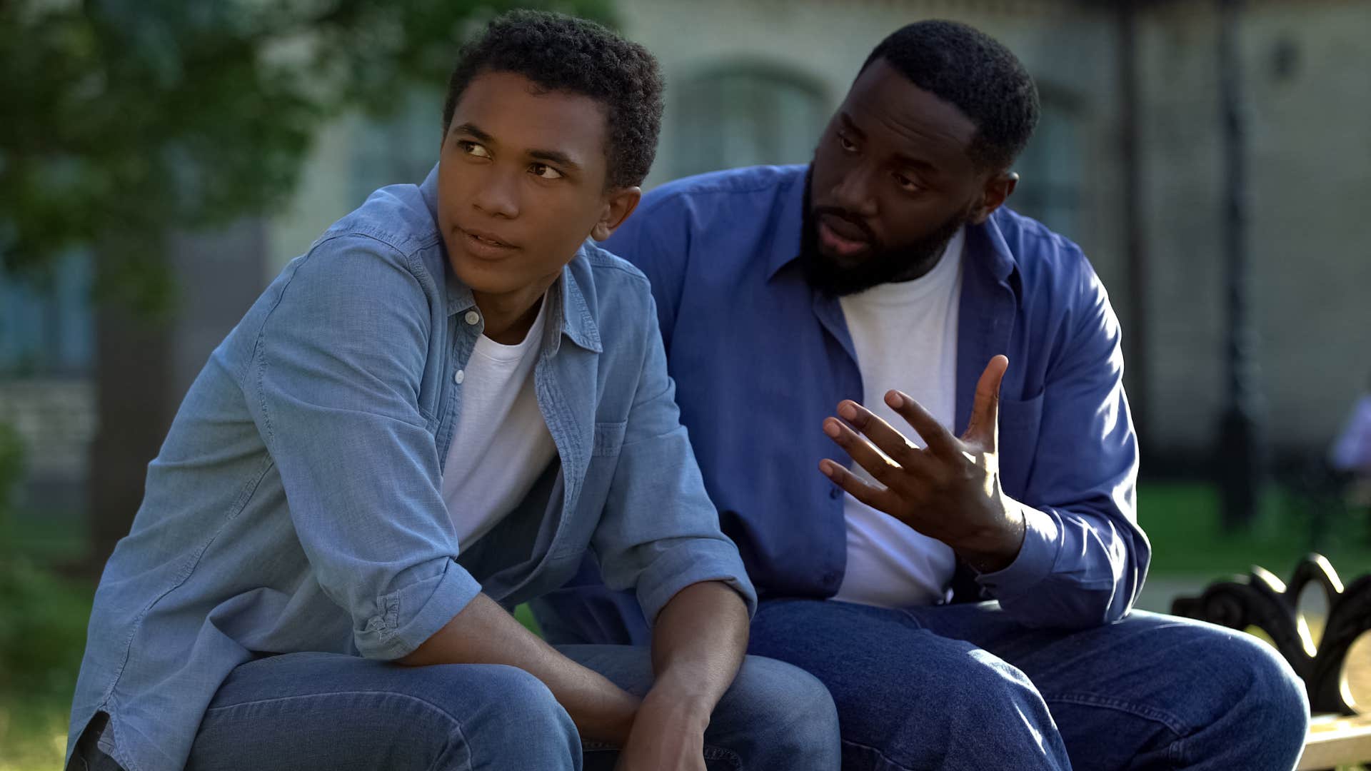 dad scolding teen son for thinking money grows on trees