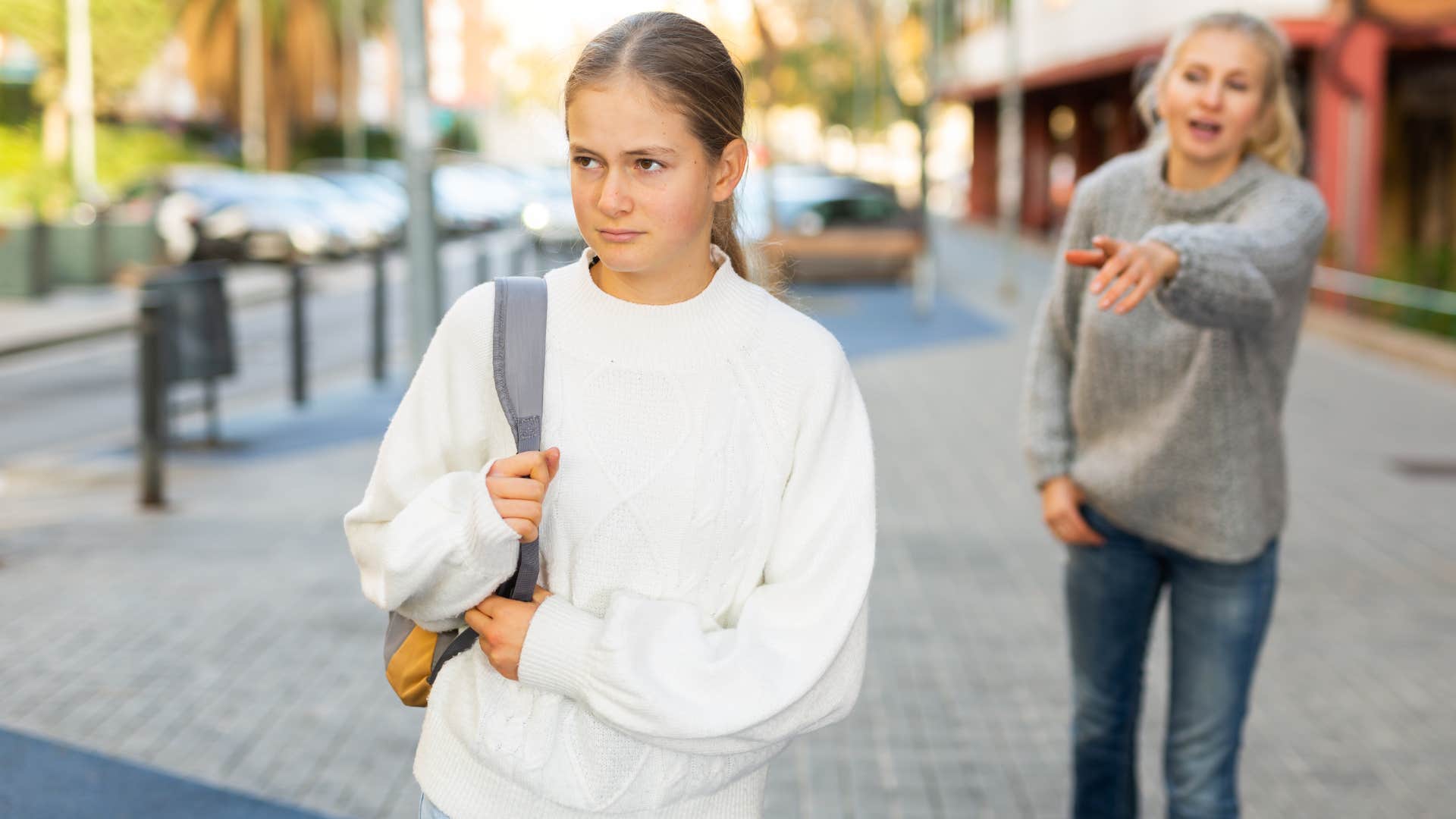 mom in gray sweater and blonde hair screaming at daughter that she'll understand when she's older