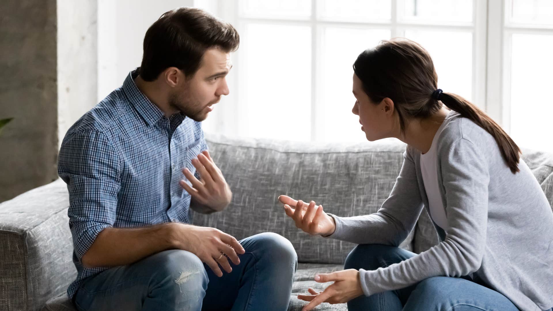 couple arguing husband saying hes not good with emotions
