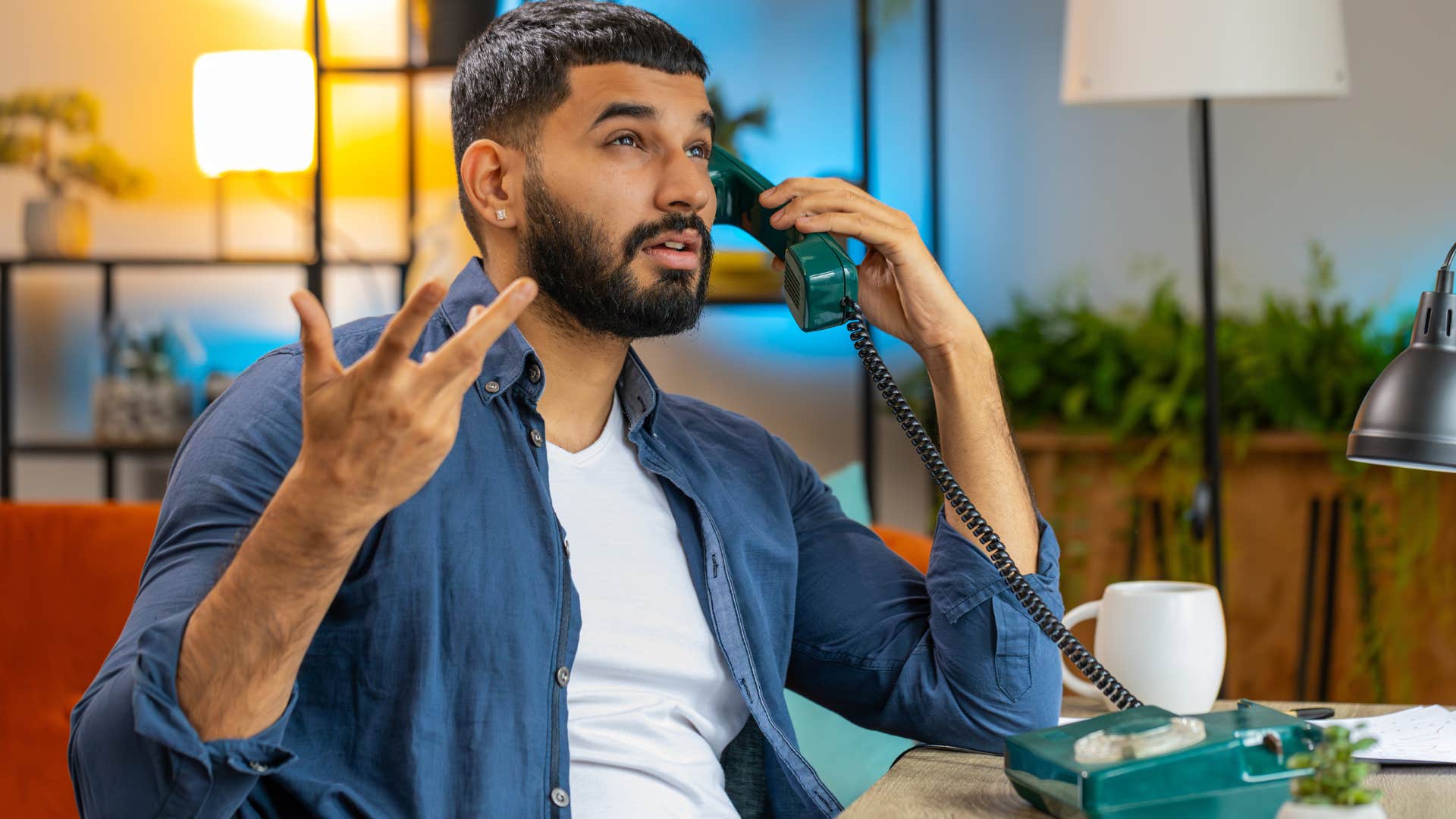 Man saying "you're lucky I even talk to you" on the phone.