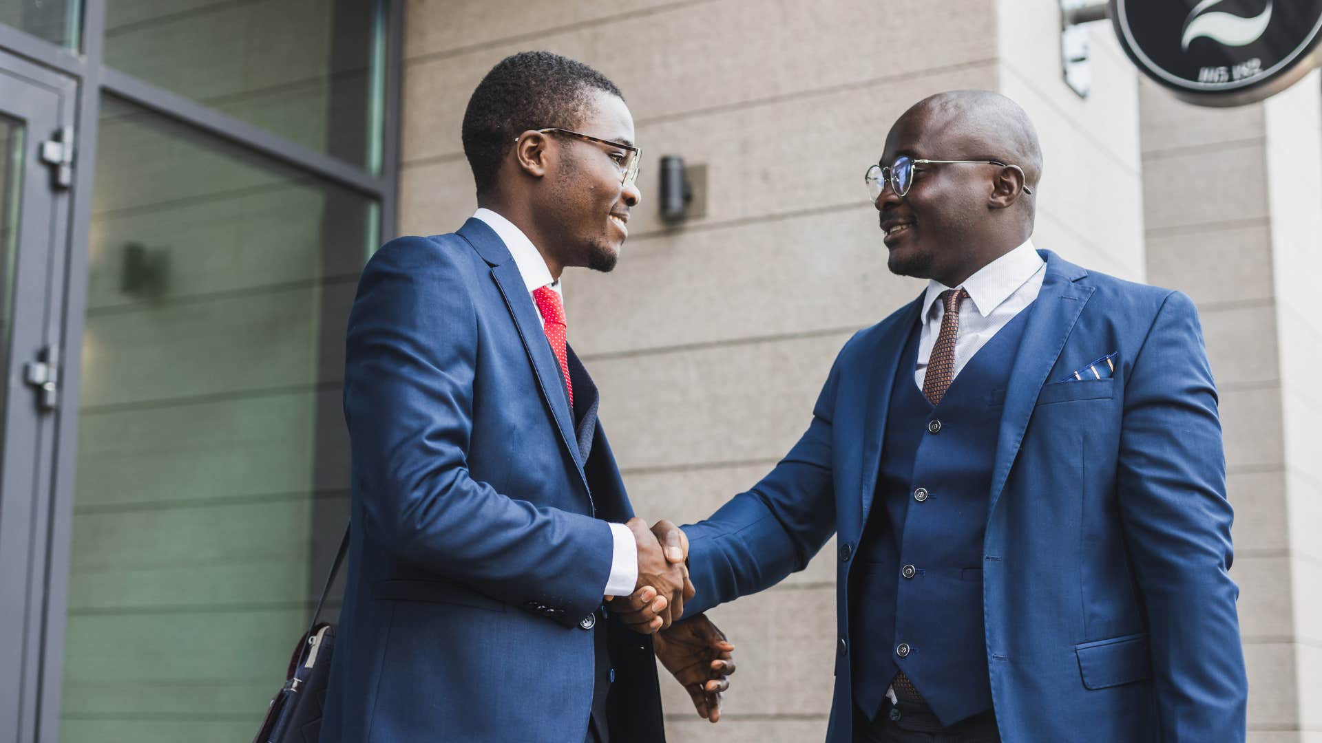 black businessmen shaking hands