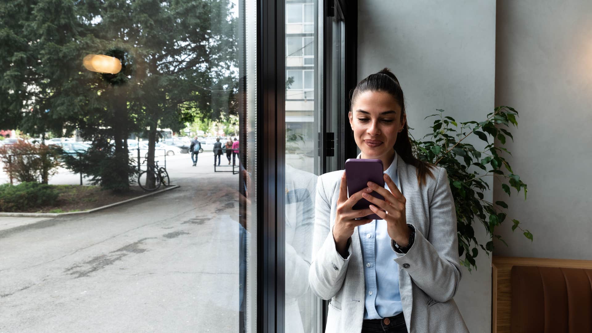 woman checking phone notifications