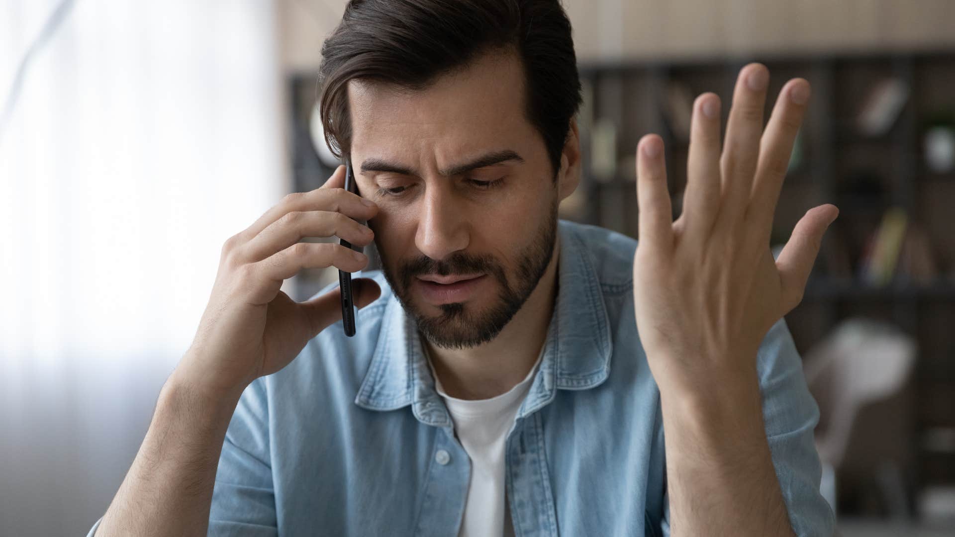 man saying why didn't you tell me angrily on the phone