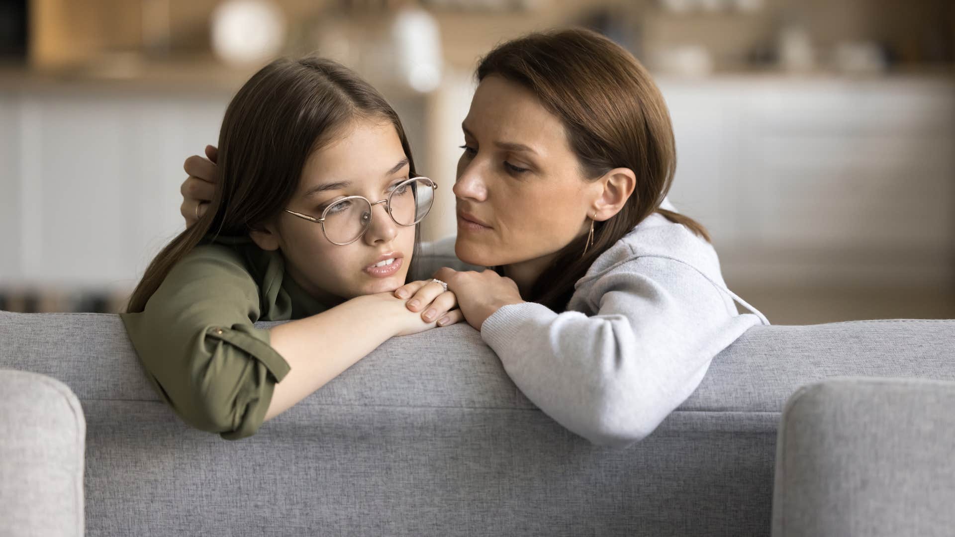 young girl telling her mother she just wants everyone to be happy