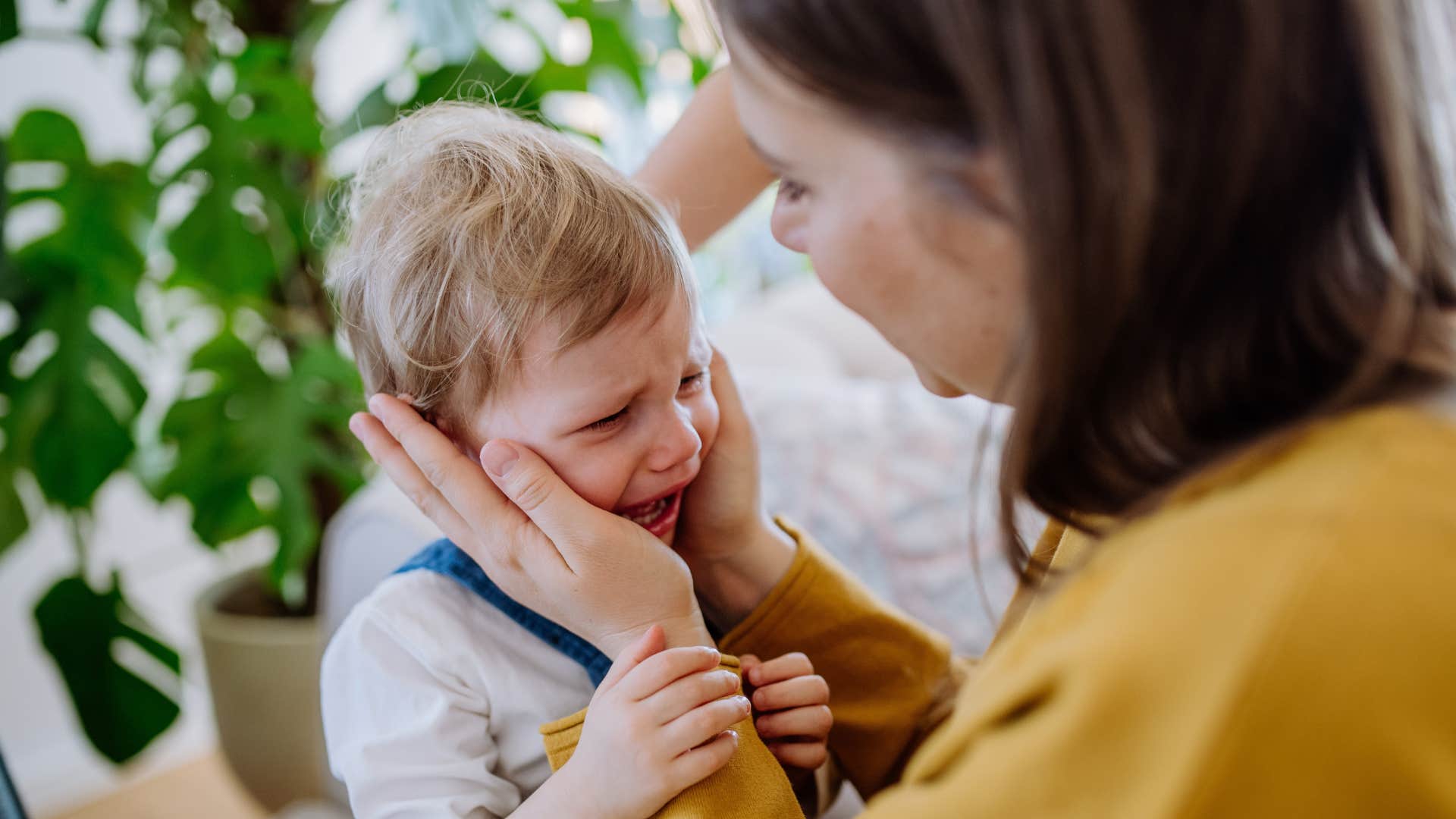 mom telling toddler they are just going to look not buy