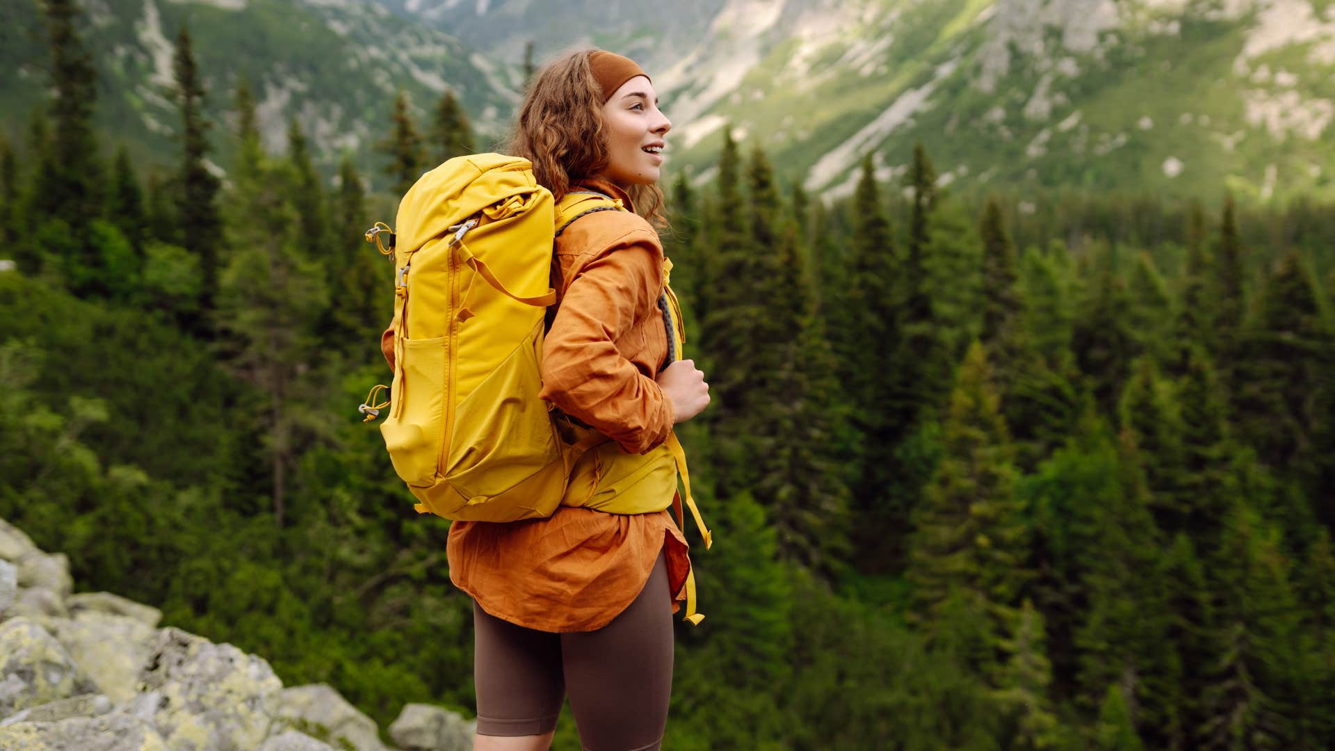 a woman hikes on her own journey to break a world record