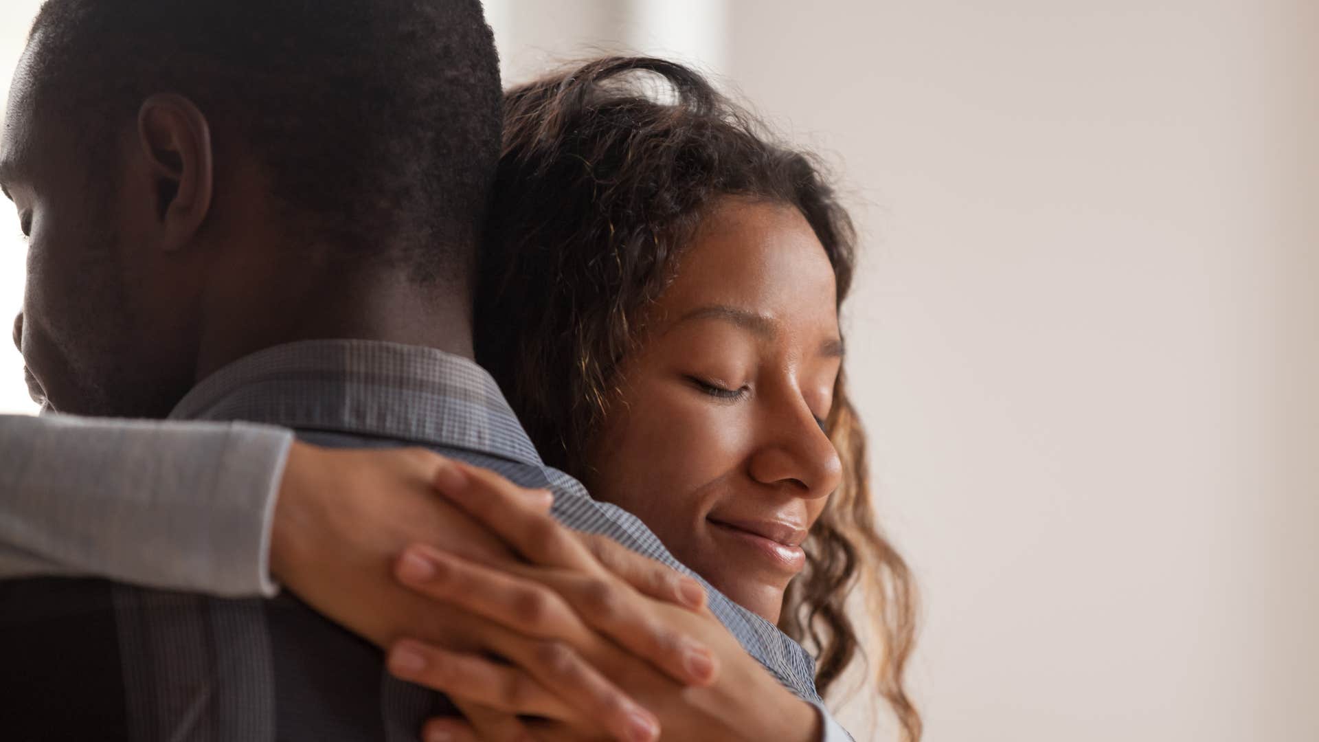 woman hugging man who is going through a lot