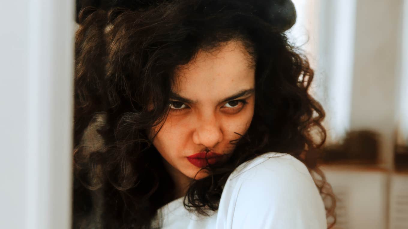 Woman trying to manage anger without hurting the person she loves.