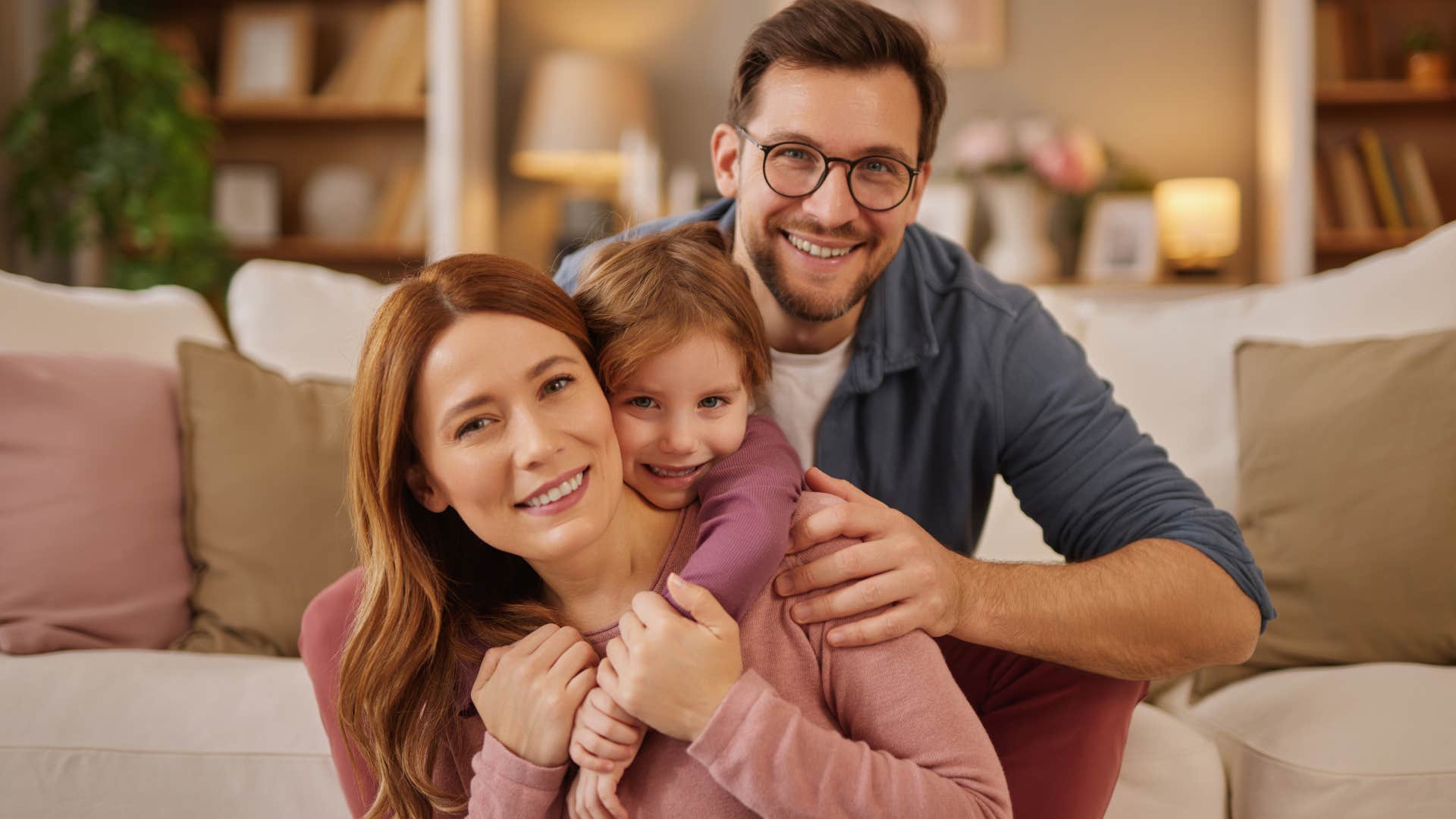 Man who makes sacrifices for you smiling with his family.