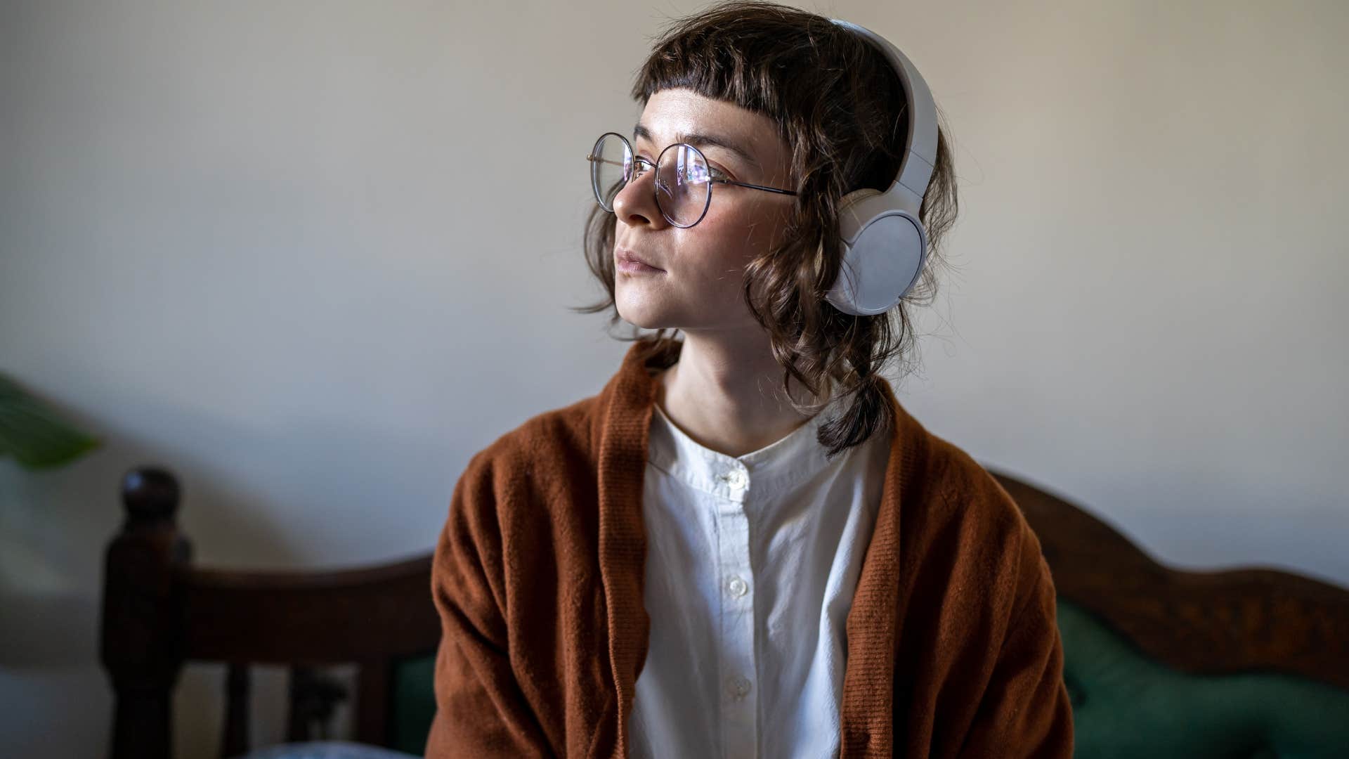woman listening to podcast for perspective