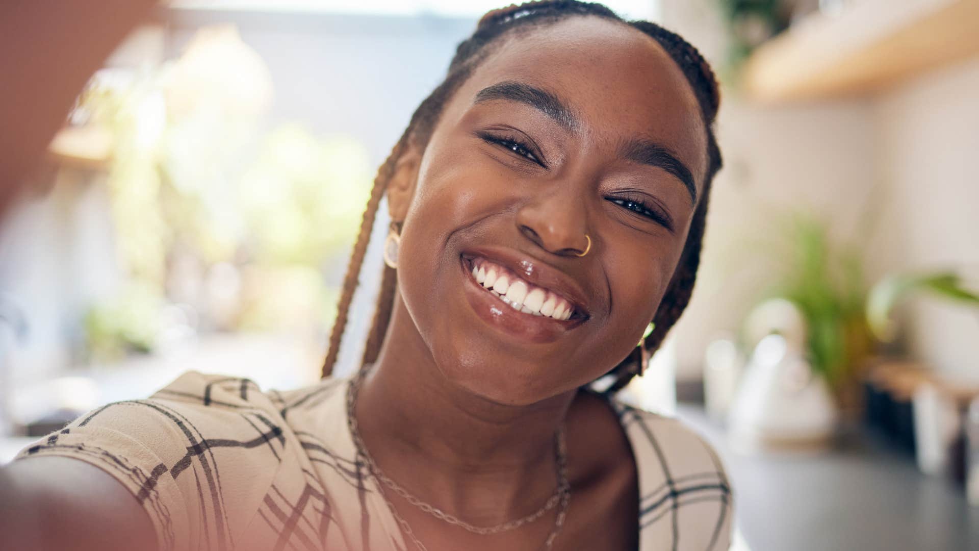 woman smiling while embracing her weird side