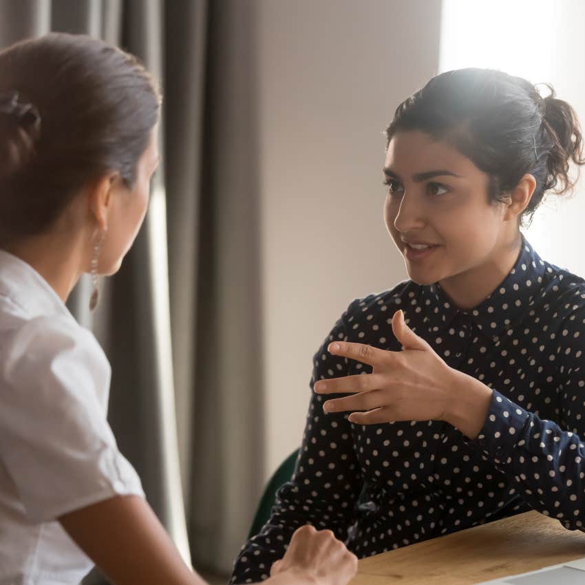 woman who quietly demands respect talking with someone