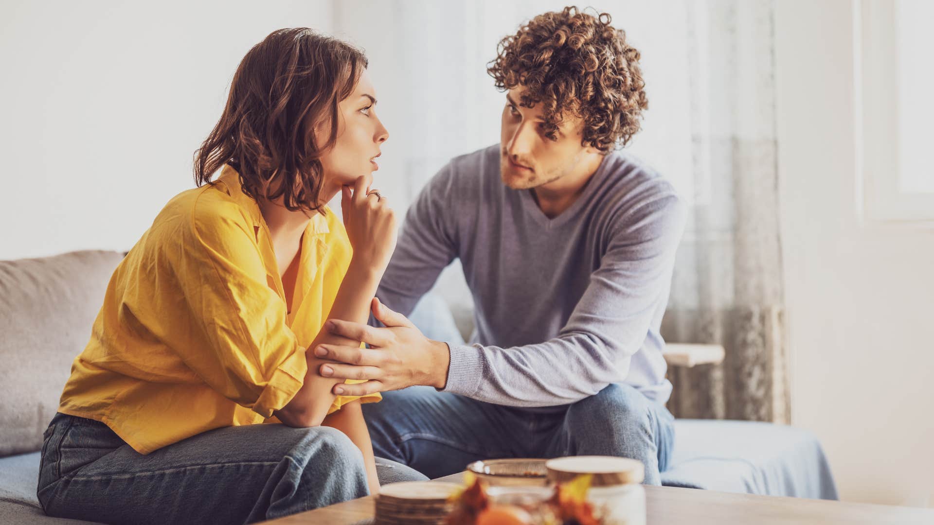 man in love telling woman he wants to help her