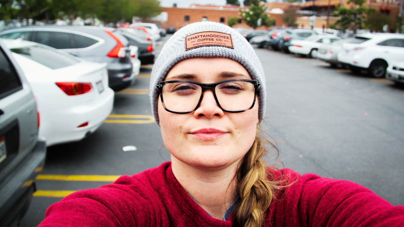 Rare Qualities That Make A Person Resilient To Their Core, According To Psychology Resilient person with her head held high.