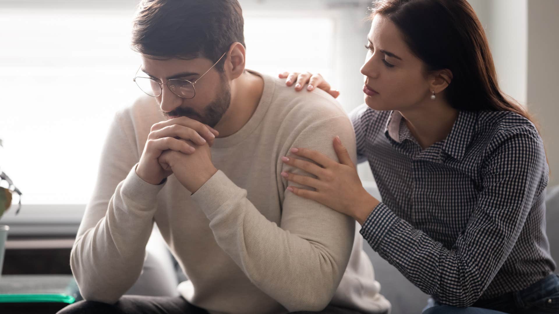 man asking wife for support feeling sad