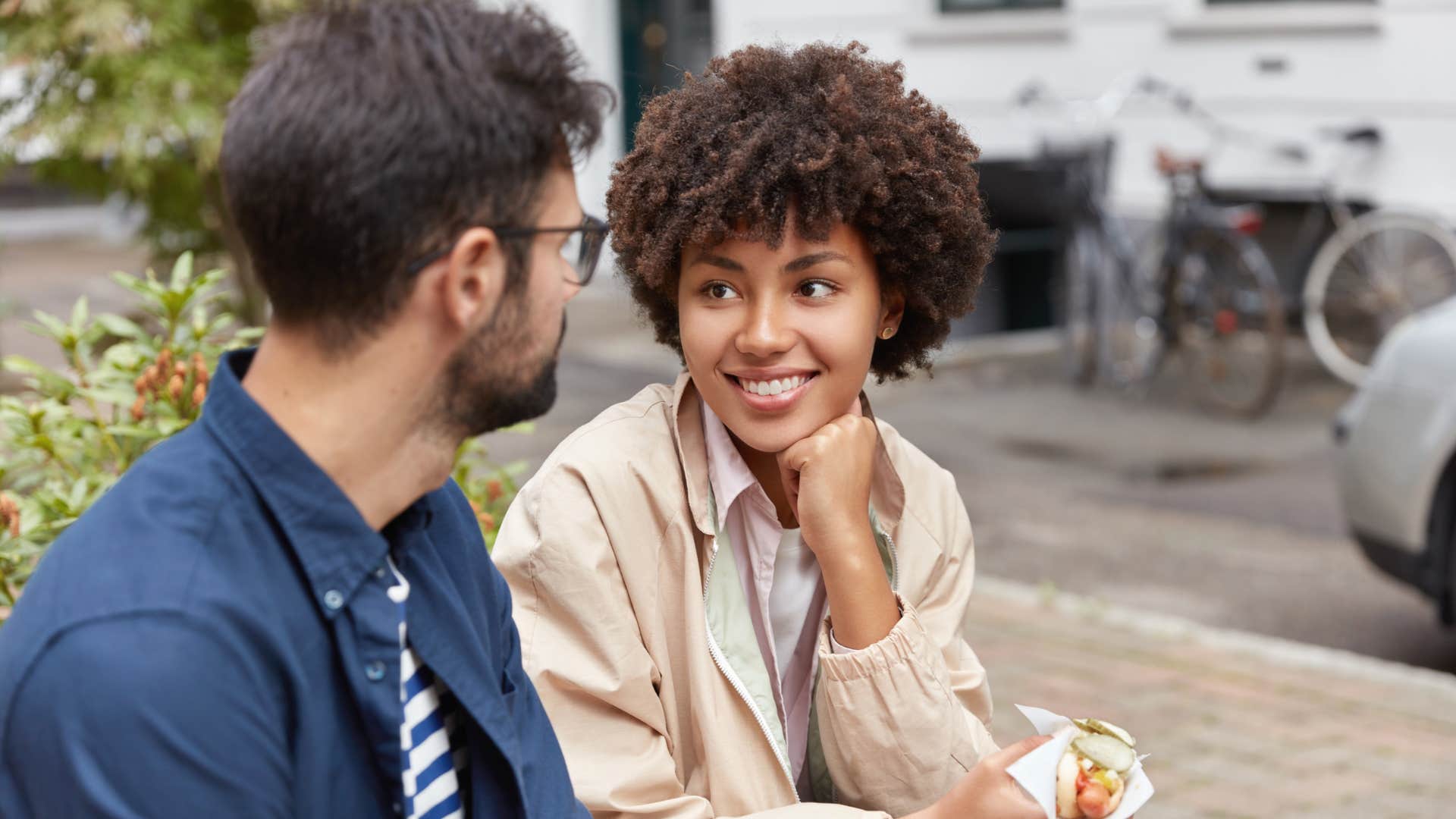 woman smiling with man keeping it real not taking conversation personally