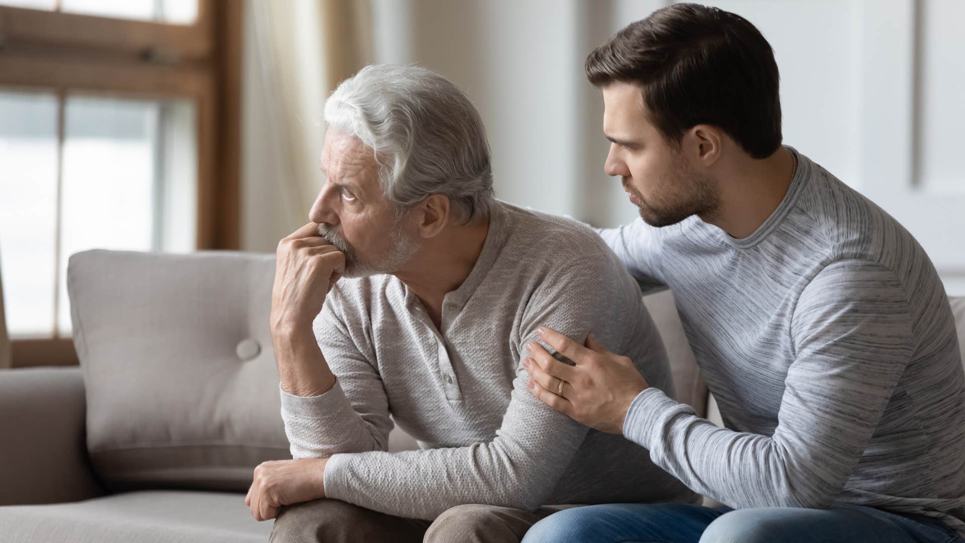 Man who tries to overstep boundaries comforting his upset dad.