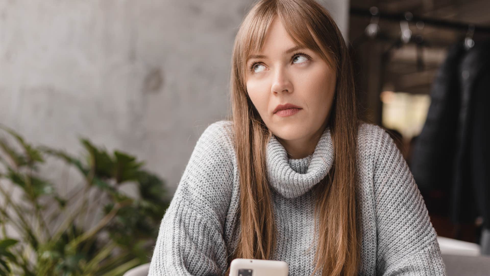 Woman who views their parents as obligations rolling her eyes.