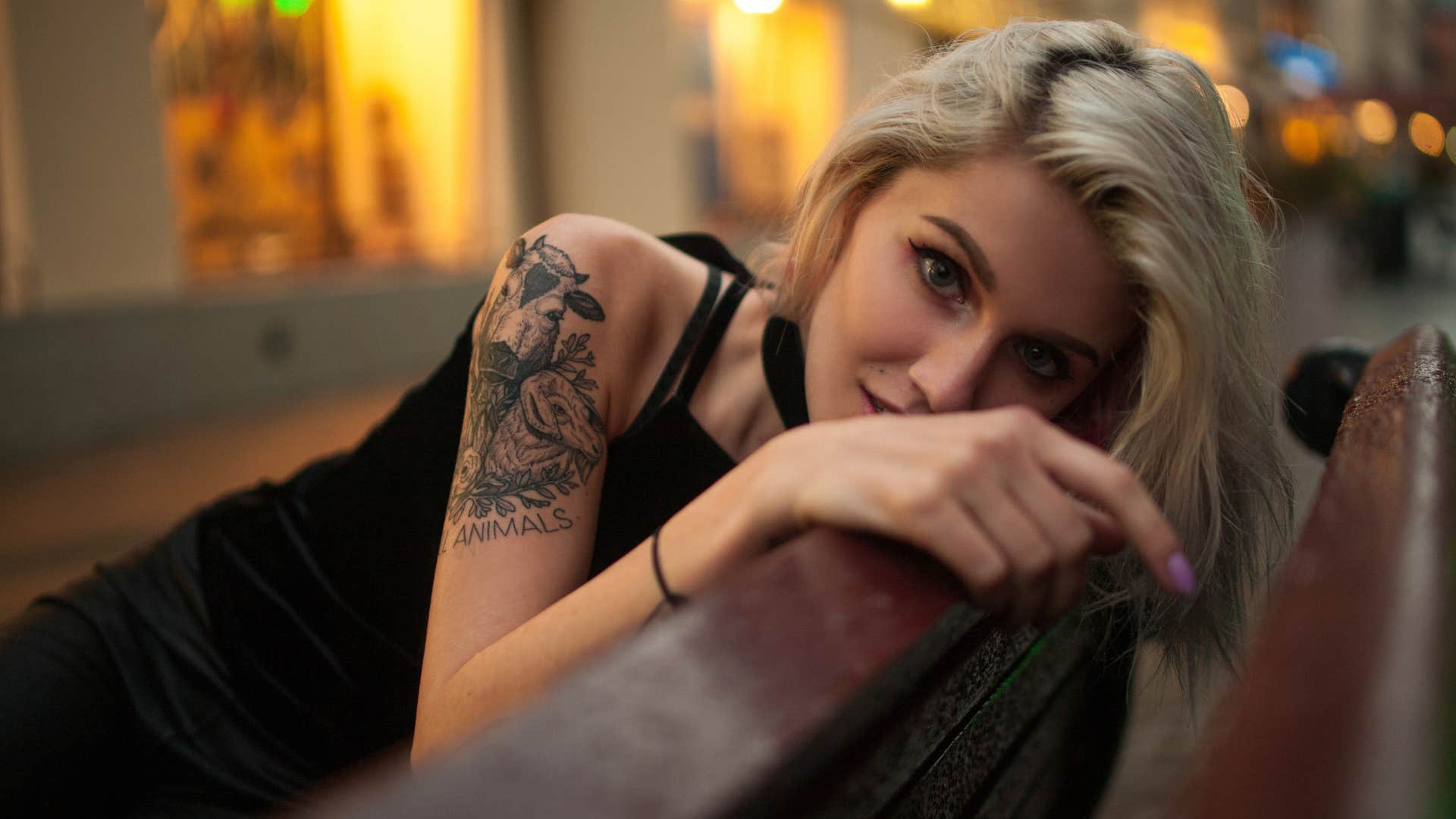woman with tattoos cherishes memories and wants to make new ones