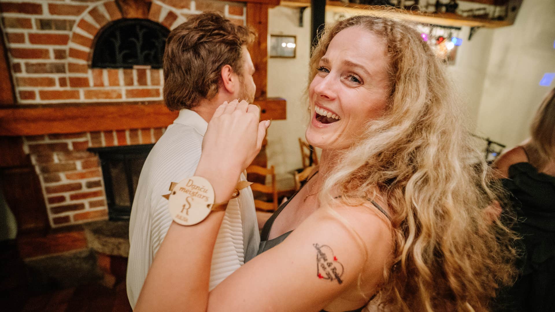 woman with tattoos wears her heart on her sleeve
