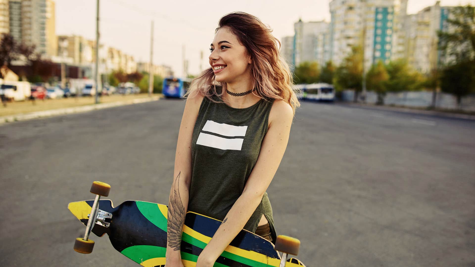 young woman with tattoos is always up for a little bit of fun