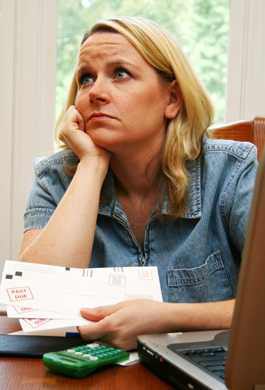 Woman who can barely pay bills let alone afford the most recommended budgeting strategy