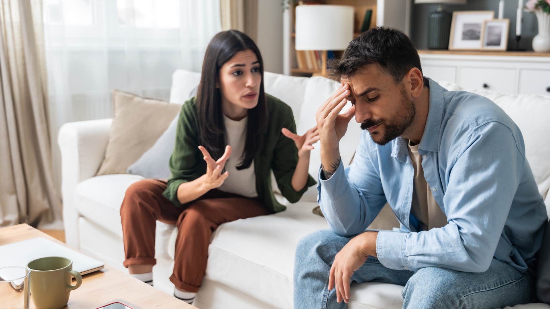 lazy husband being yelled at by wife telling him to have ambition