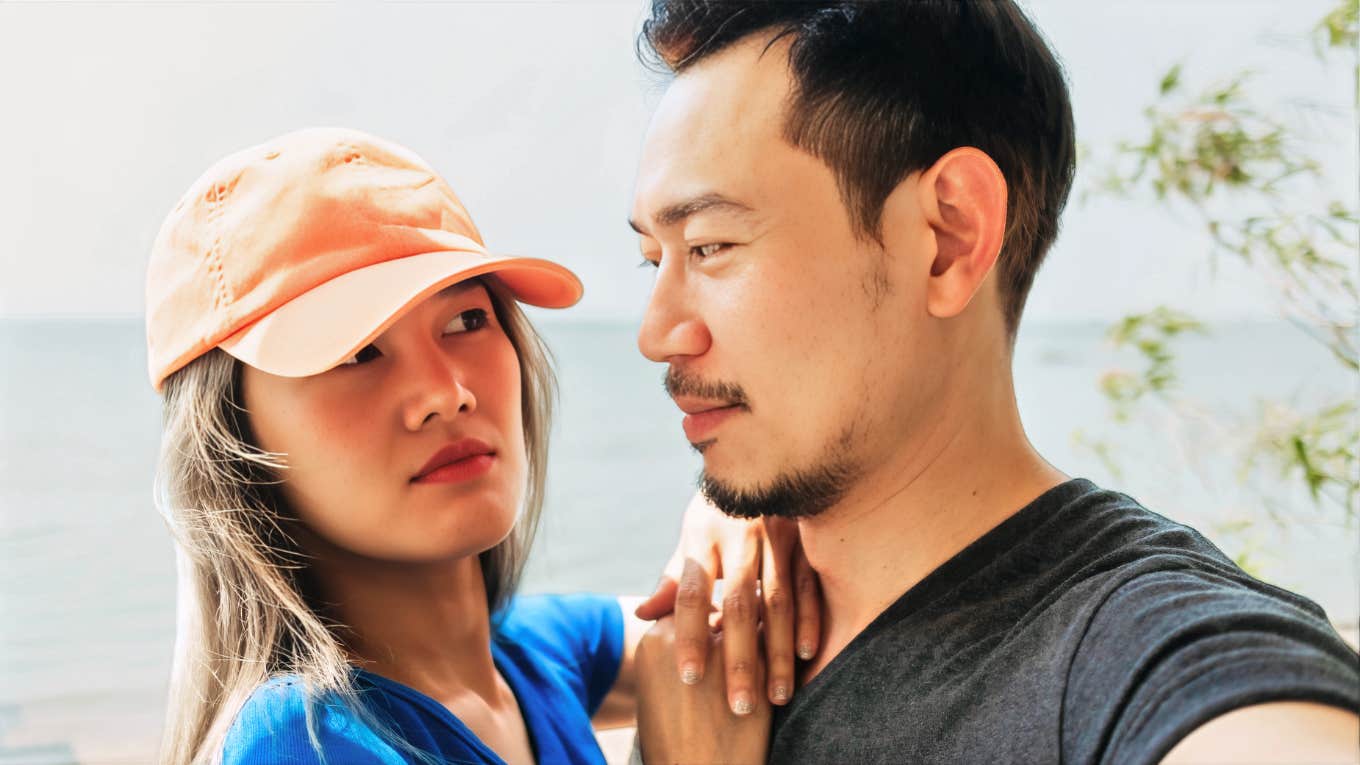 Relationship Red Flags That Reveal a Deep Emotional Mismatch, According To Psychology Couple with deep emotional mismatch.