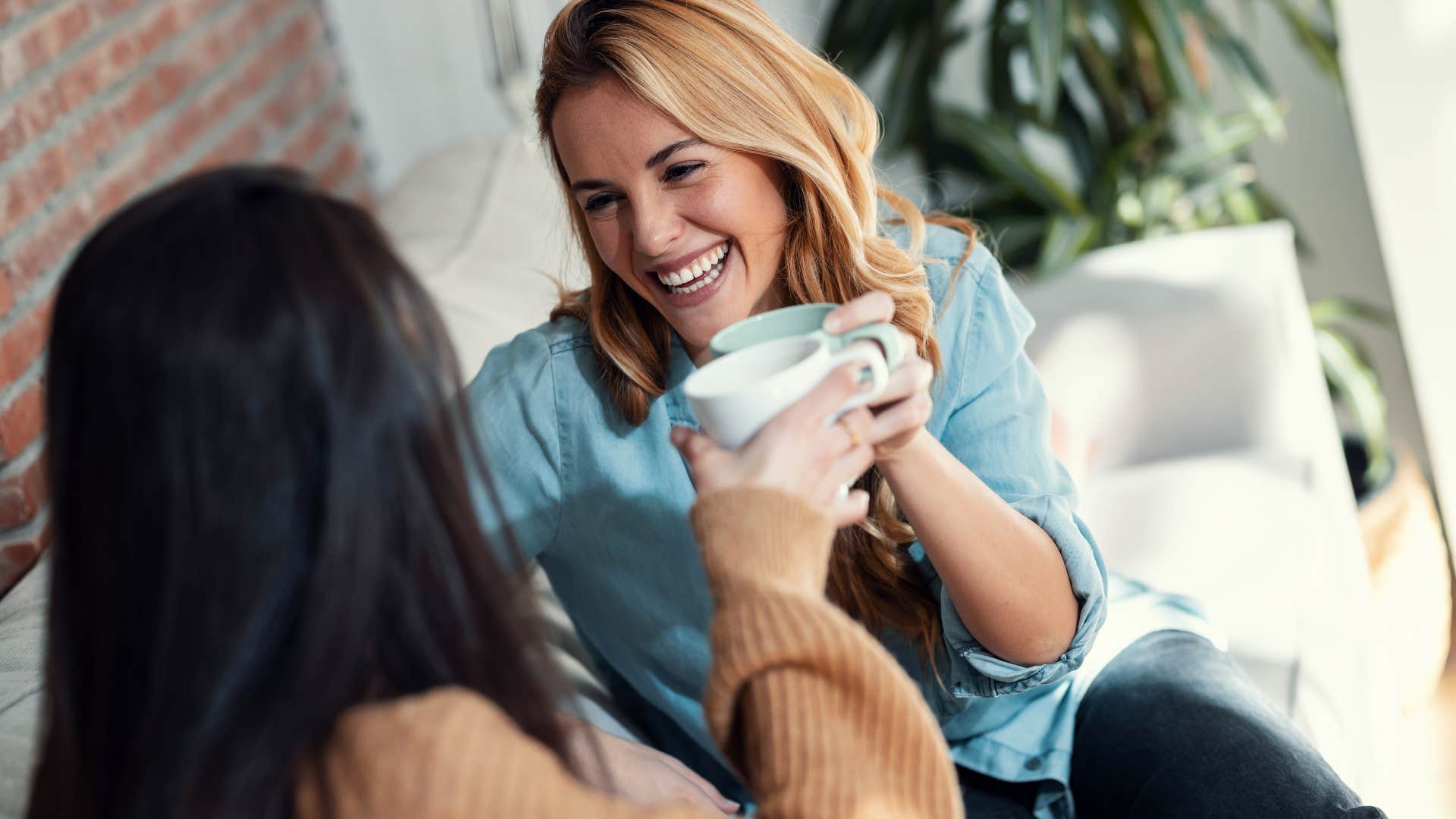 woman talking with friend about husband private information