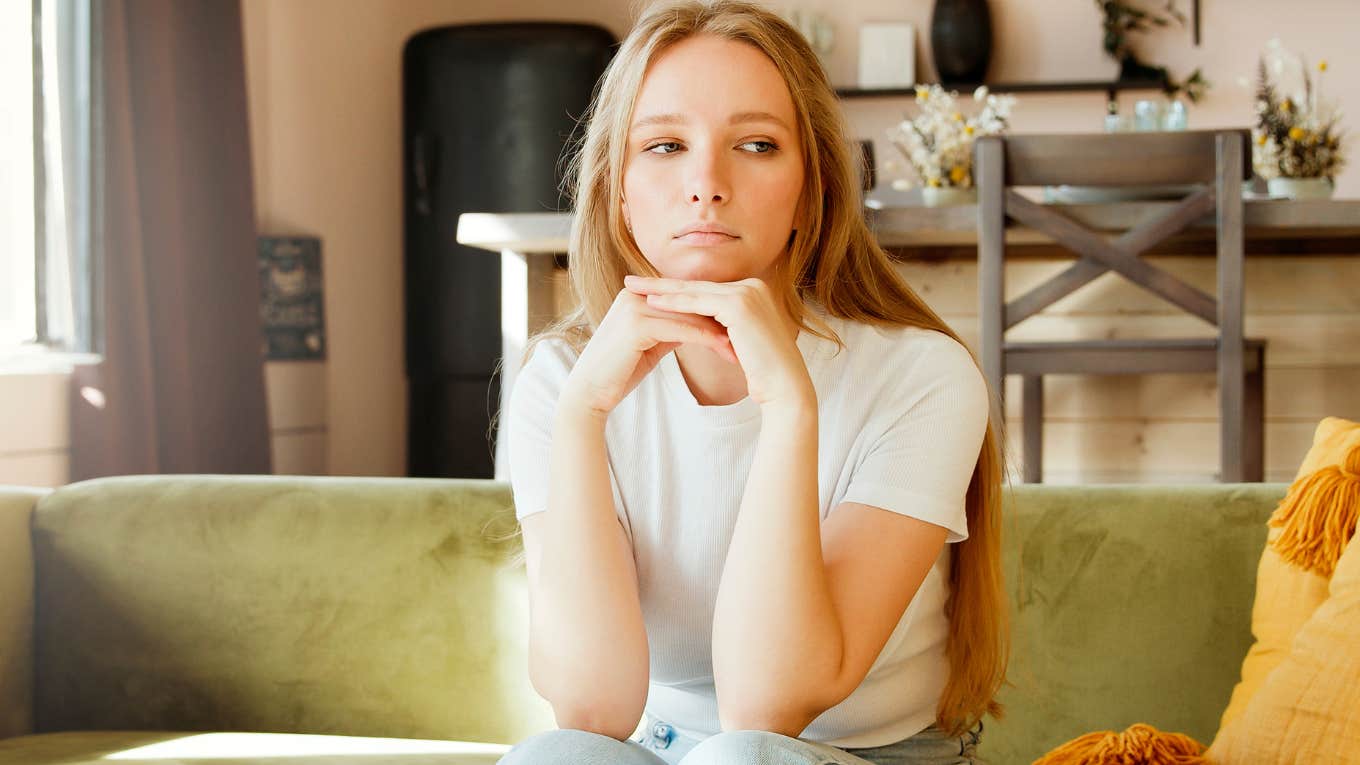 Seemingly Normal Situations That Shouldn't Give Gen Z Anxiety, But Absolutely Do young gen z woman looking anxious
