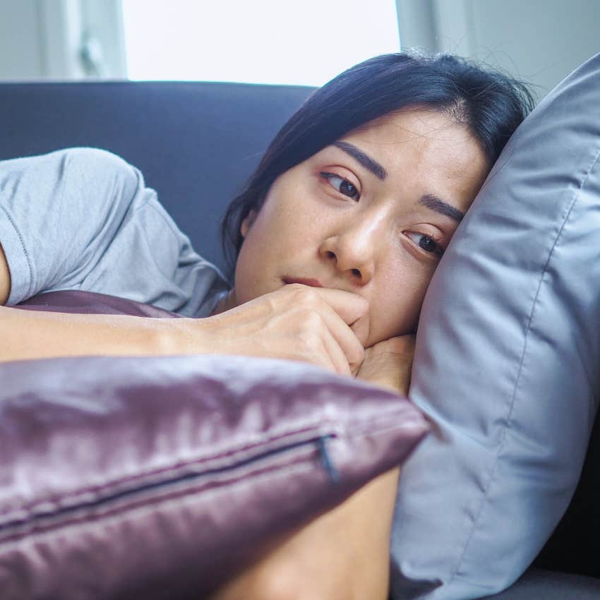 quietly miserable woman who disregards her mental health