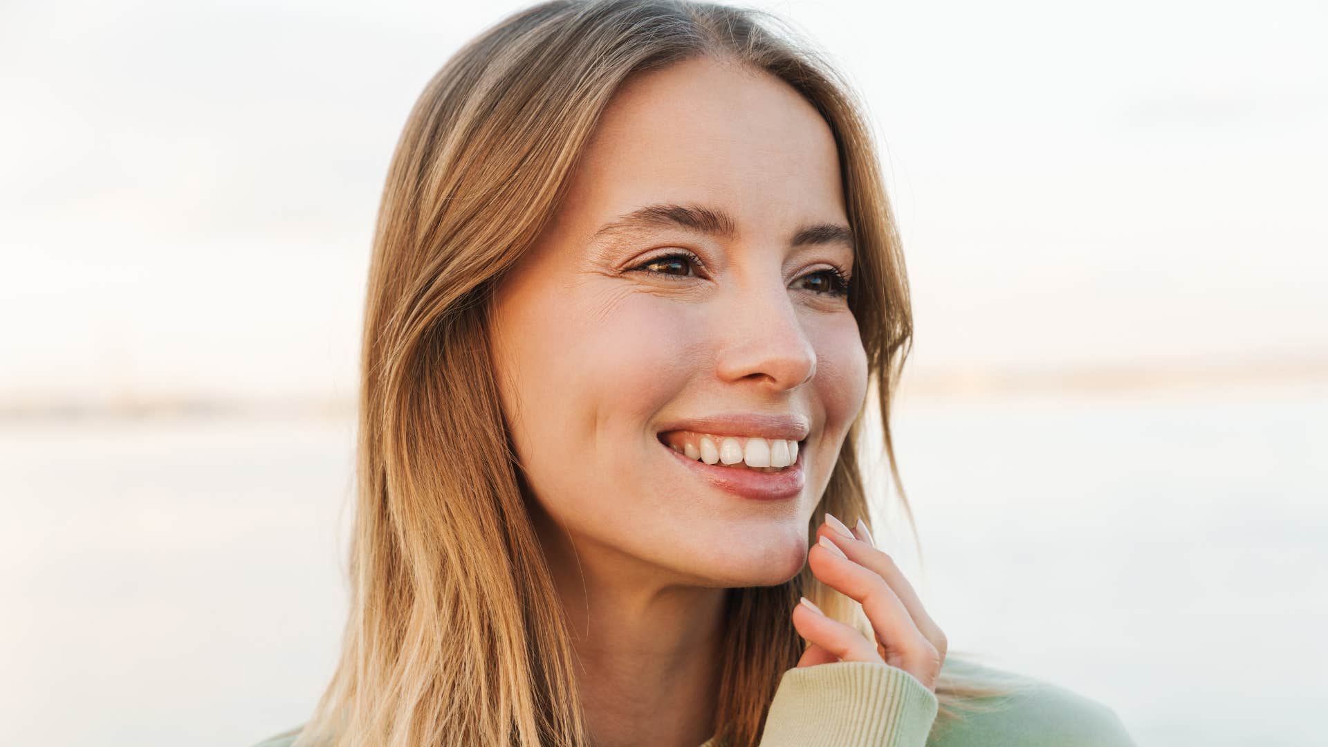 woman smiling knowing she did the right thing