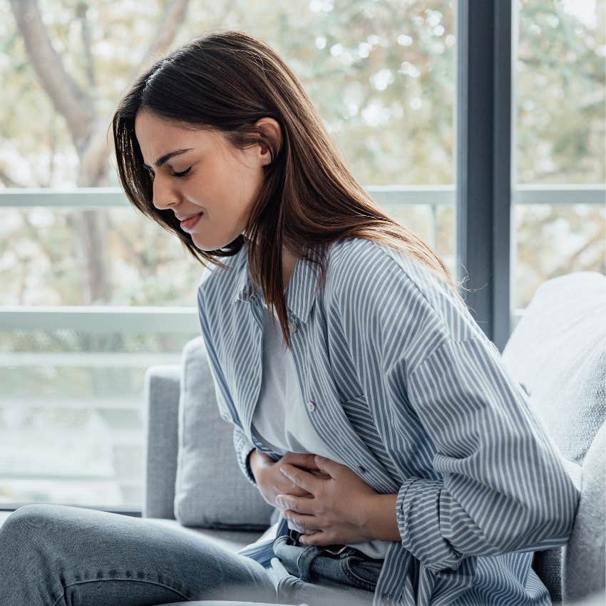 woman who is constantly stressed with gastrointestinal problems