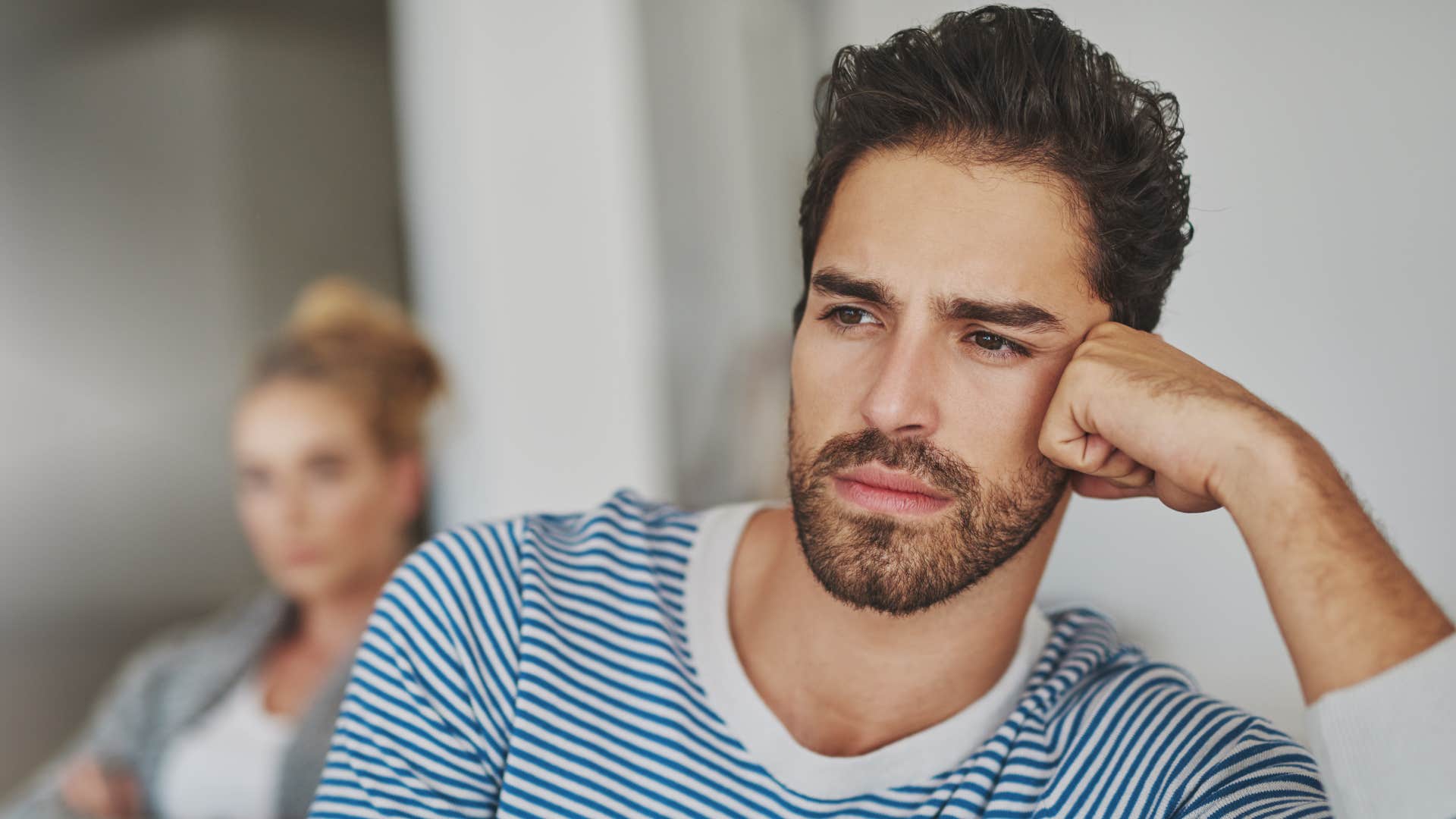 a man feels emotionally disconnected from everyone