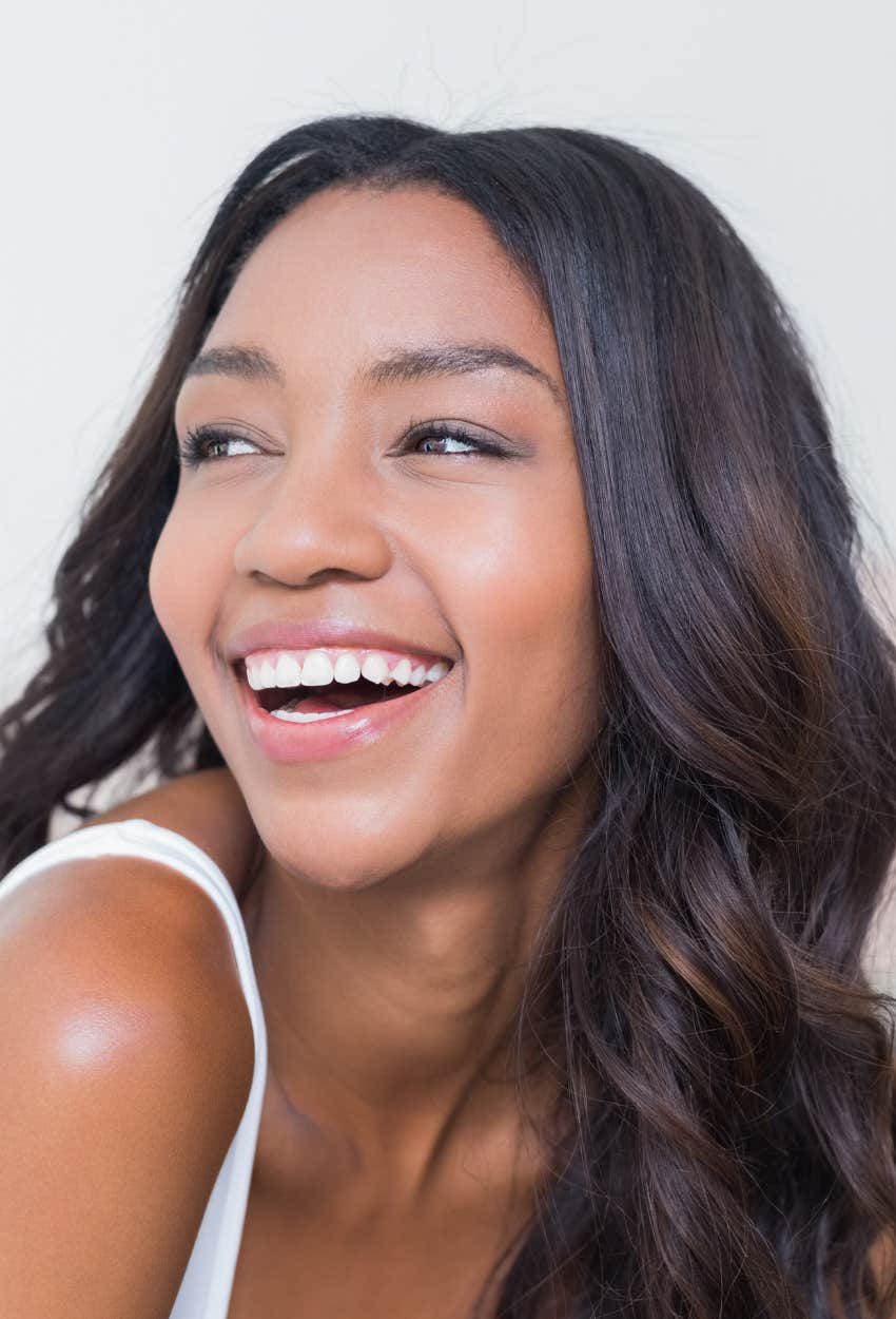 Woman who glows because of a healthy and powerful aura